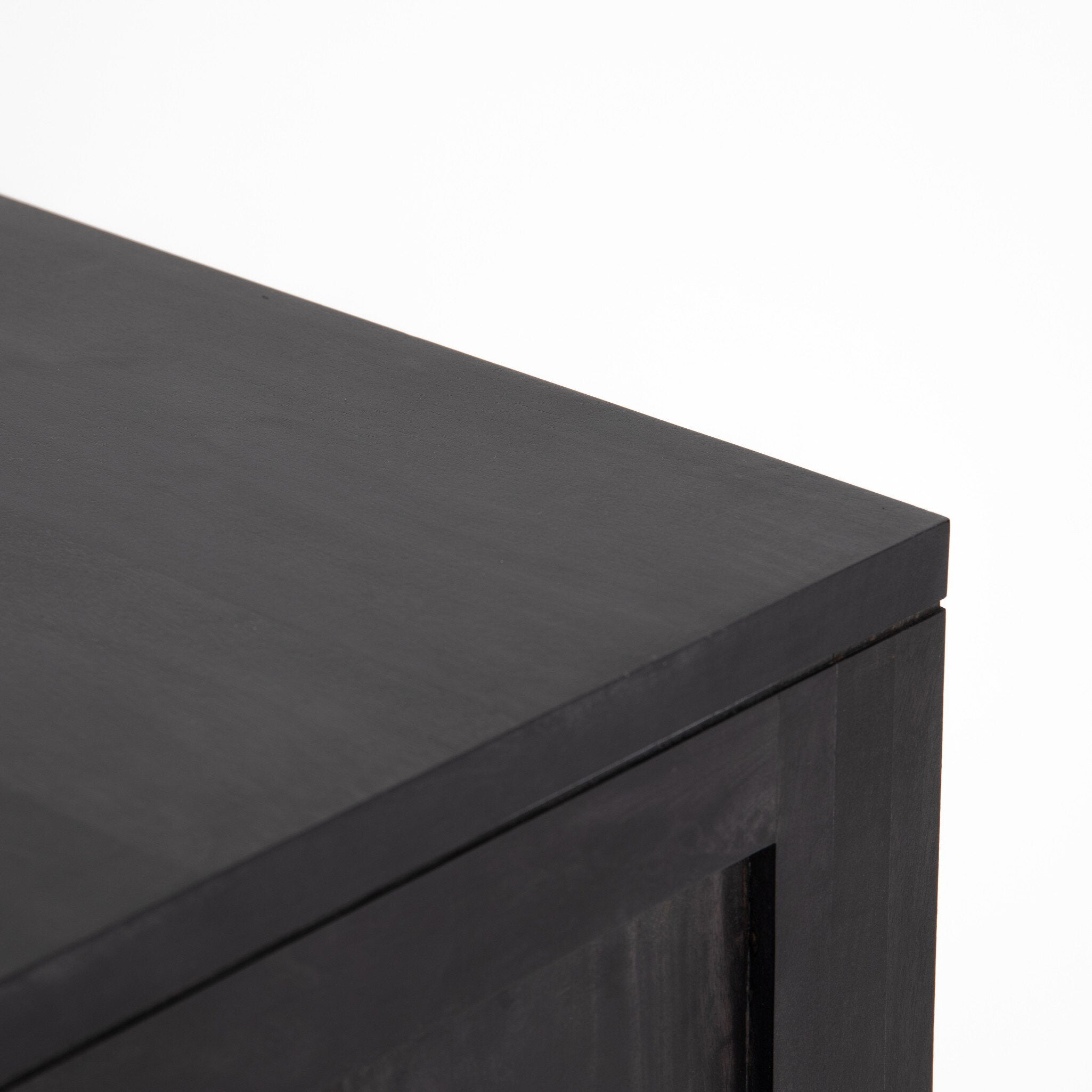 Closeup of the top of the the black Tilde Sideboard.