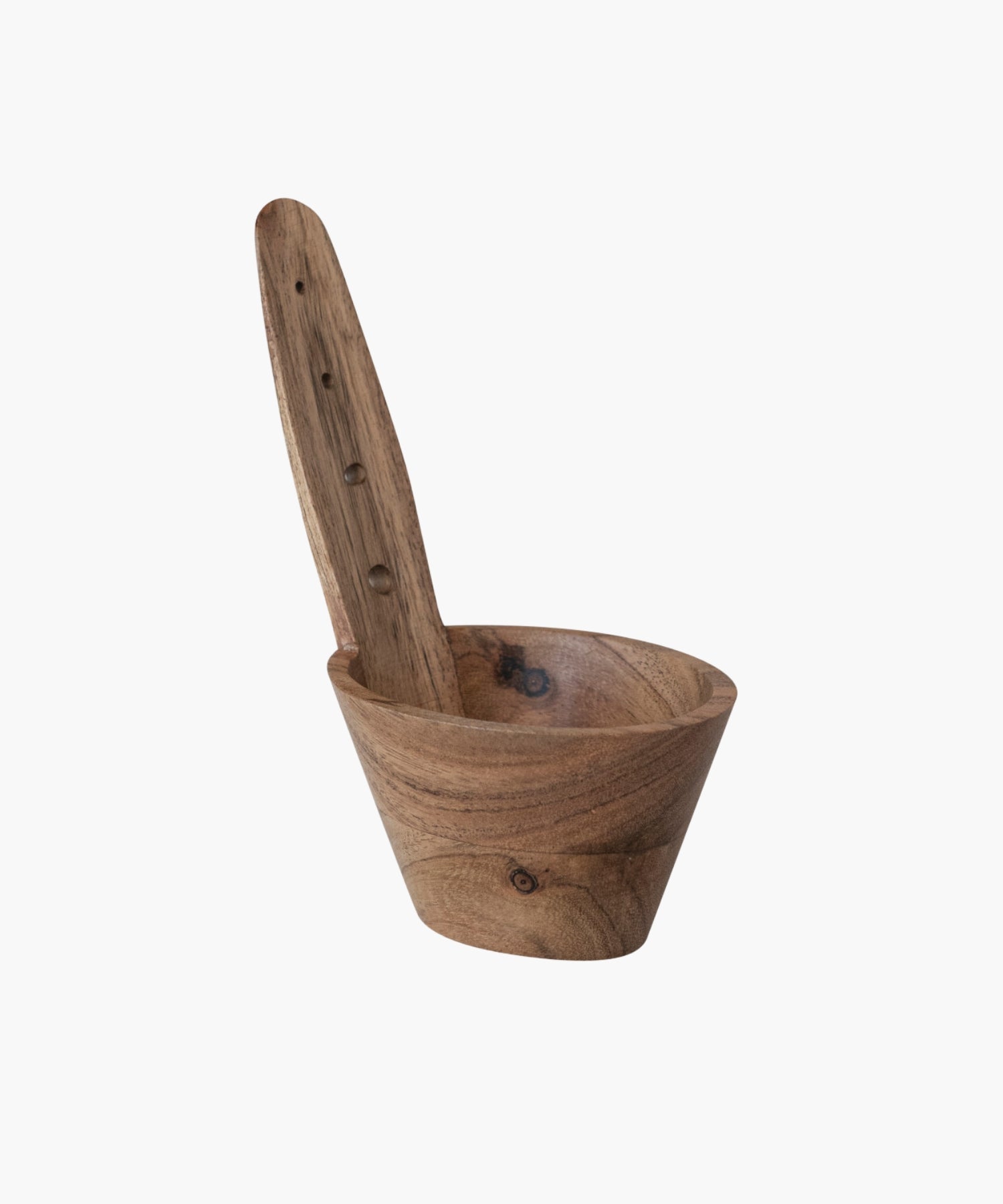 A natural Acacia wood herb stripper featuring a cylindrical bowl and a paddle-like handle with holes. The wood grain is prominent, conveying a rustic, hand-crafted feel. | Wildwood Home Co.