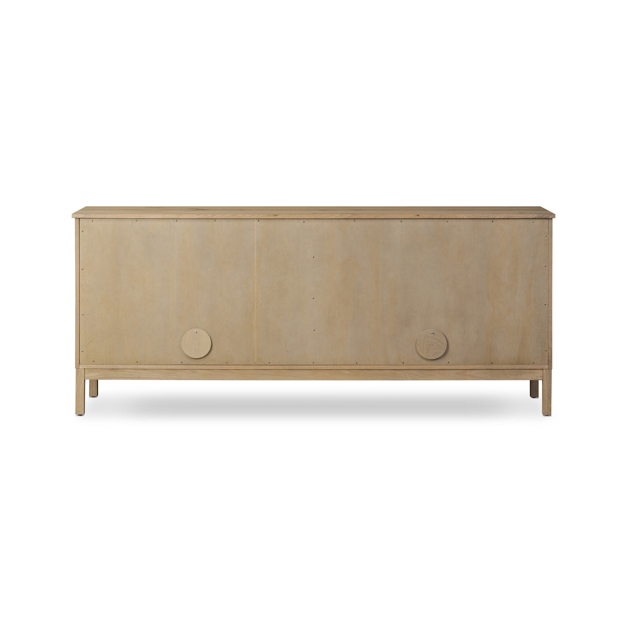 The back of a wood sideboard with a grid like pattern on the doors on a white background.