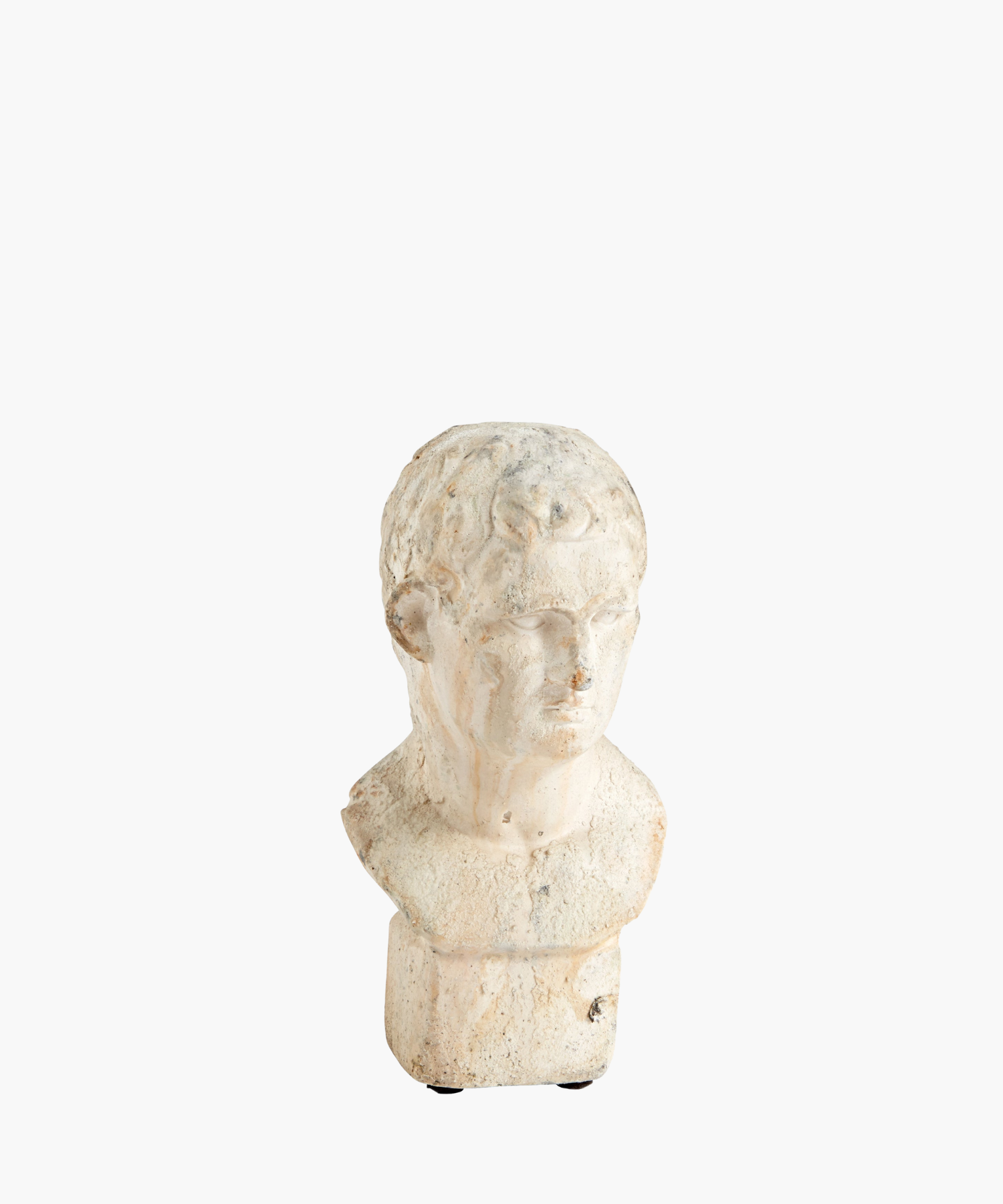 A weathered marble bust of a male figure with short hair, expressionless face, and chipped surface, evoking a sense of ancient history and timelessness.