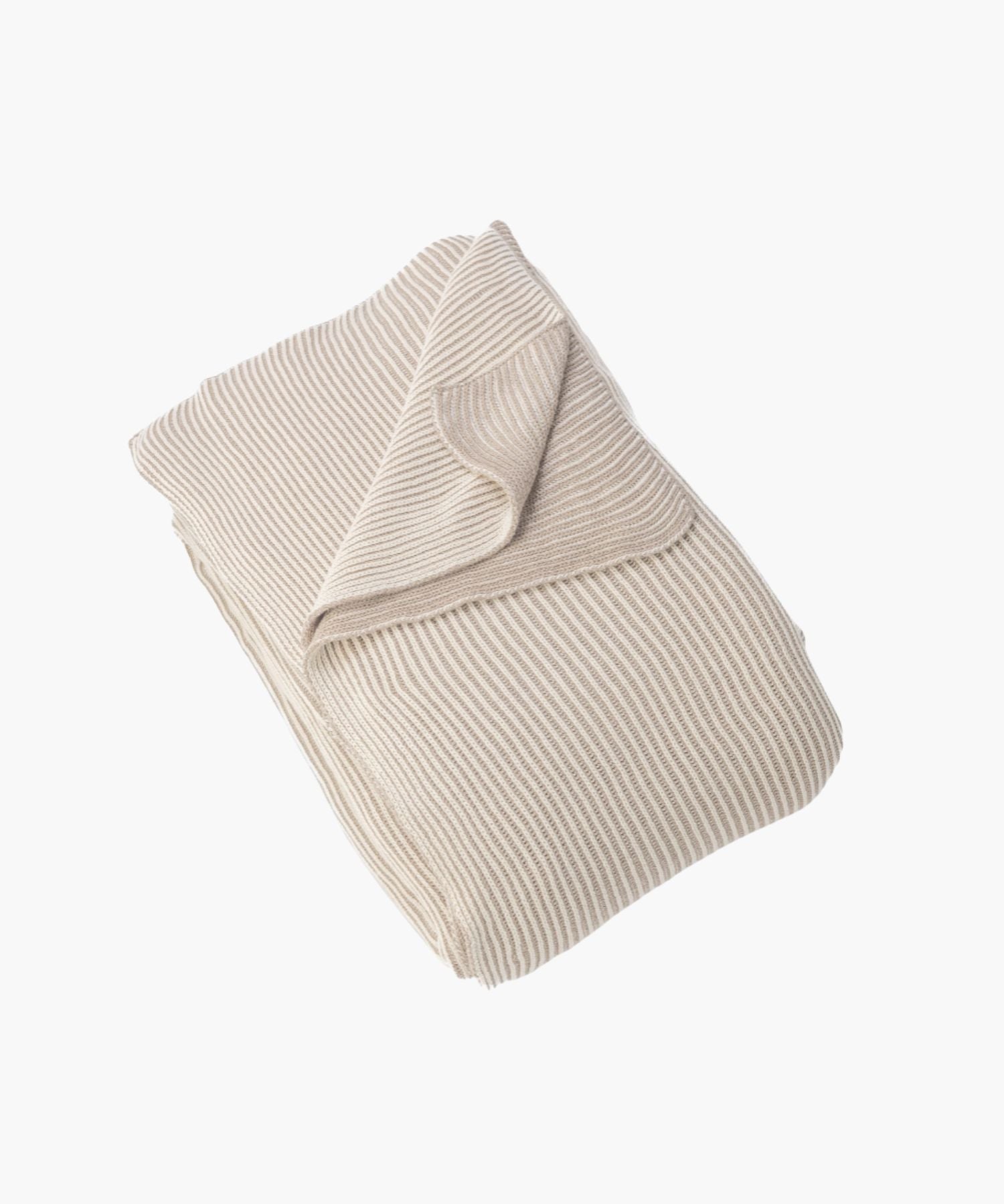 Folded view of the Amory Coverlet in cream-toned ribbed knit, showcasing its soft drape and plush texture. | Wildwood Home Co.