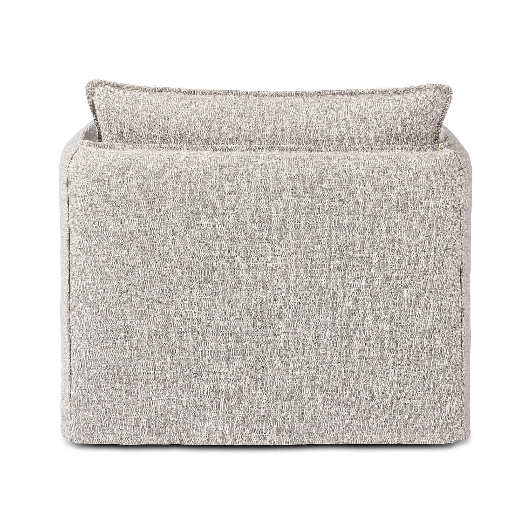 The back of a neutral gray outdoor swivel armchair with a pillow on a white background.