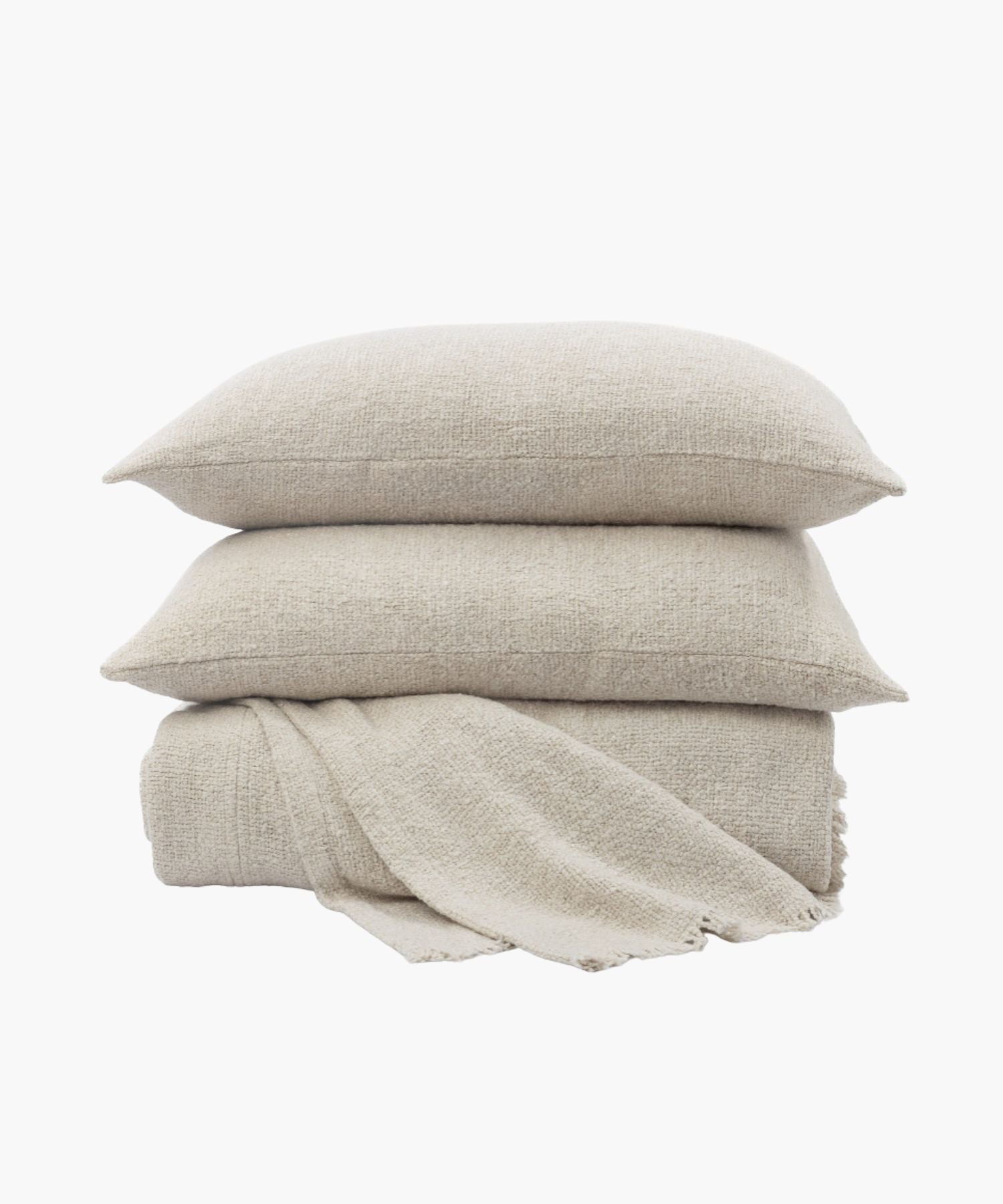 Close-up of boucle coverlet with boucle texture and soft drape over the bedding surface. | Wildwood Home Co.