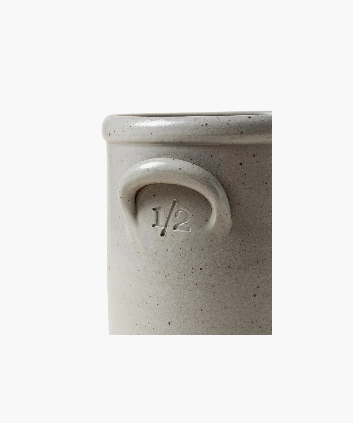 A detailed picture of a gray stoneware crock highlighting the color, texture, and size. This crock has a subtle embossed "1/2" under the handle, conveying a rustic, artisanal feel.