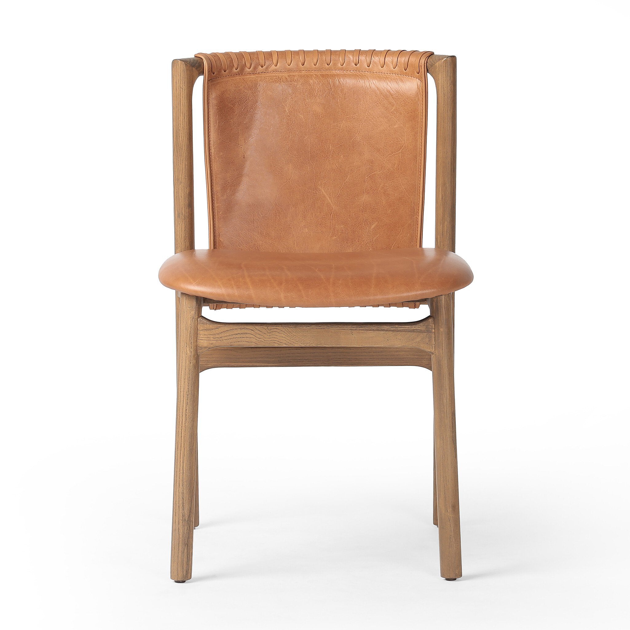 Tobacco-grain leather chair with leather wrap detailing on a wooden frame on a white background. | Wildwood Home Co.