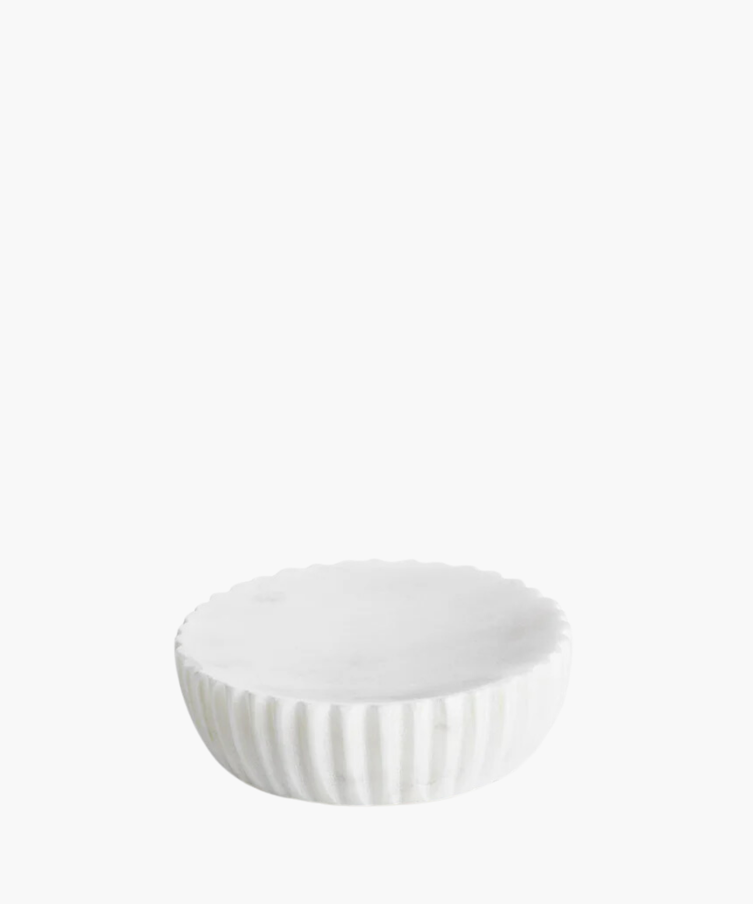 Round white marble soap dish with a scalloped edge and fluted sides. The sleek, minimalist design conveys elegance and simplicity. | Wildwood Home Co.
