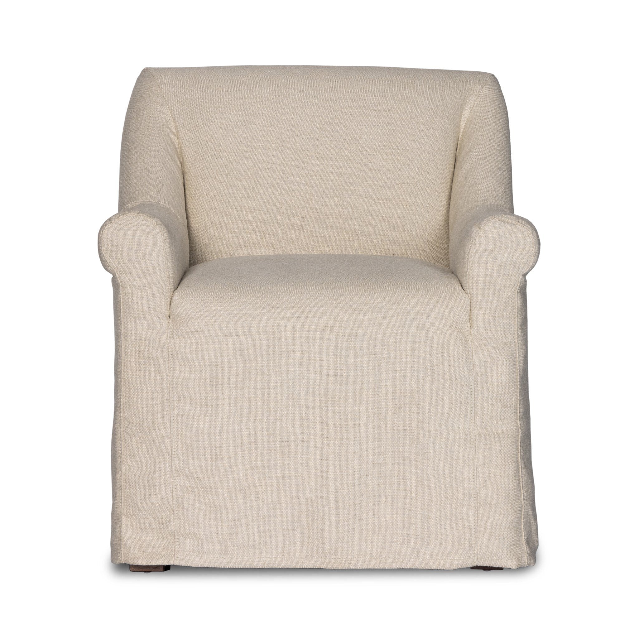 Natural slipcovered dining armchair with rolled arms on a white.background. | Wildwood Home Co.
