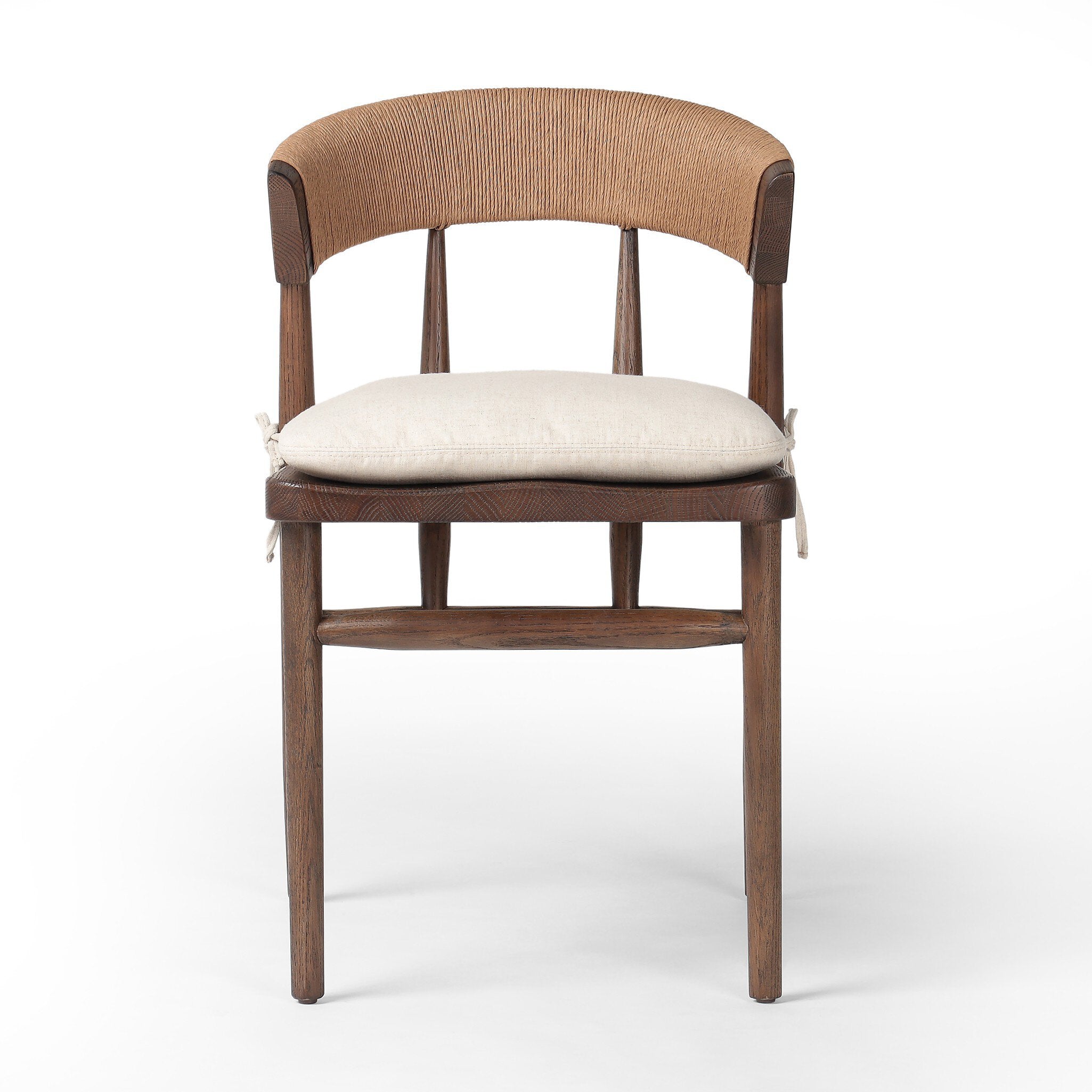 Solid oak dining chair with tapered legs, a woven backrest, and natural color seat cushion on a white background.