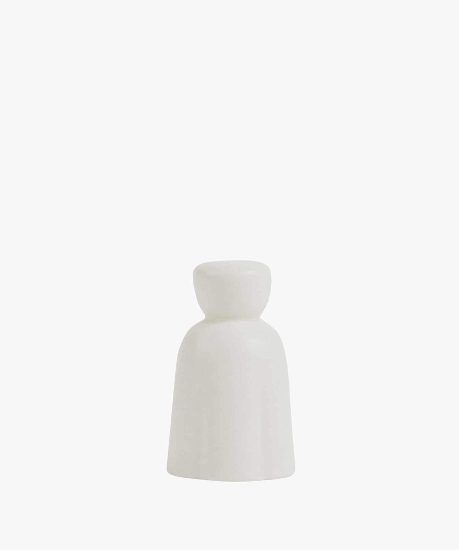Simple, white ceramic bell-shaped candle snuffer with a smooth texture, set against a white background. Minimalist design evokes a sense of calm and modernity.