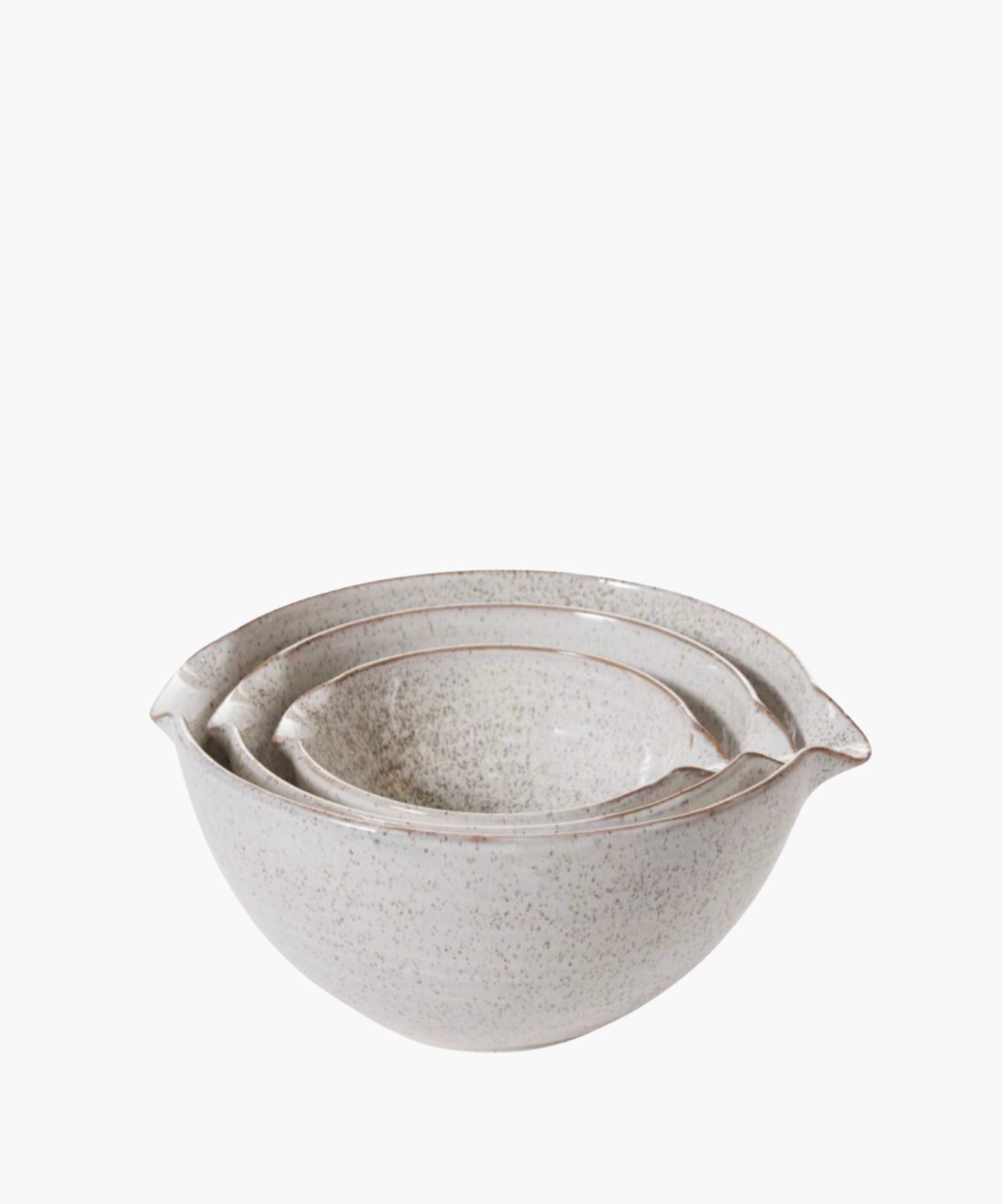 Three ceramic mixing bowls in earth tones nest together. Their rustic, speckled glaze and curved spouts offer a cozy, artisanal kitchen vibe. | Wildwood Home Co.
