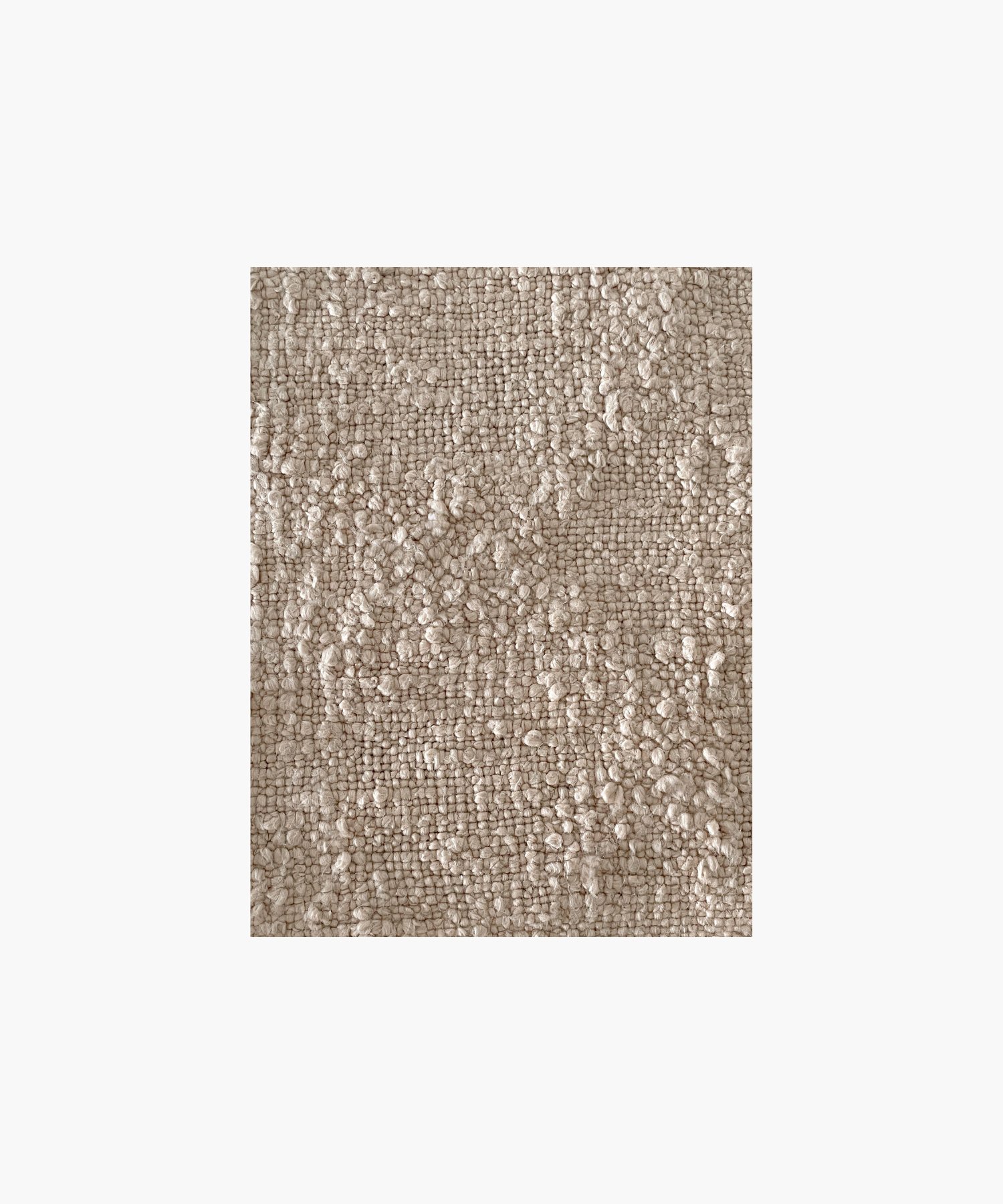 A beige colored woven throw blanket highlighting the textured pattern and color conveying a cozy and inviting feel.