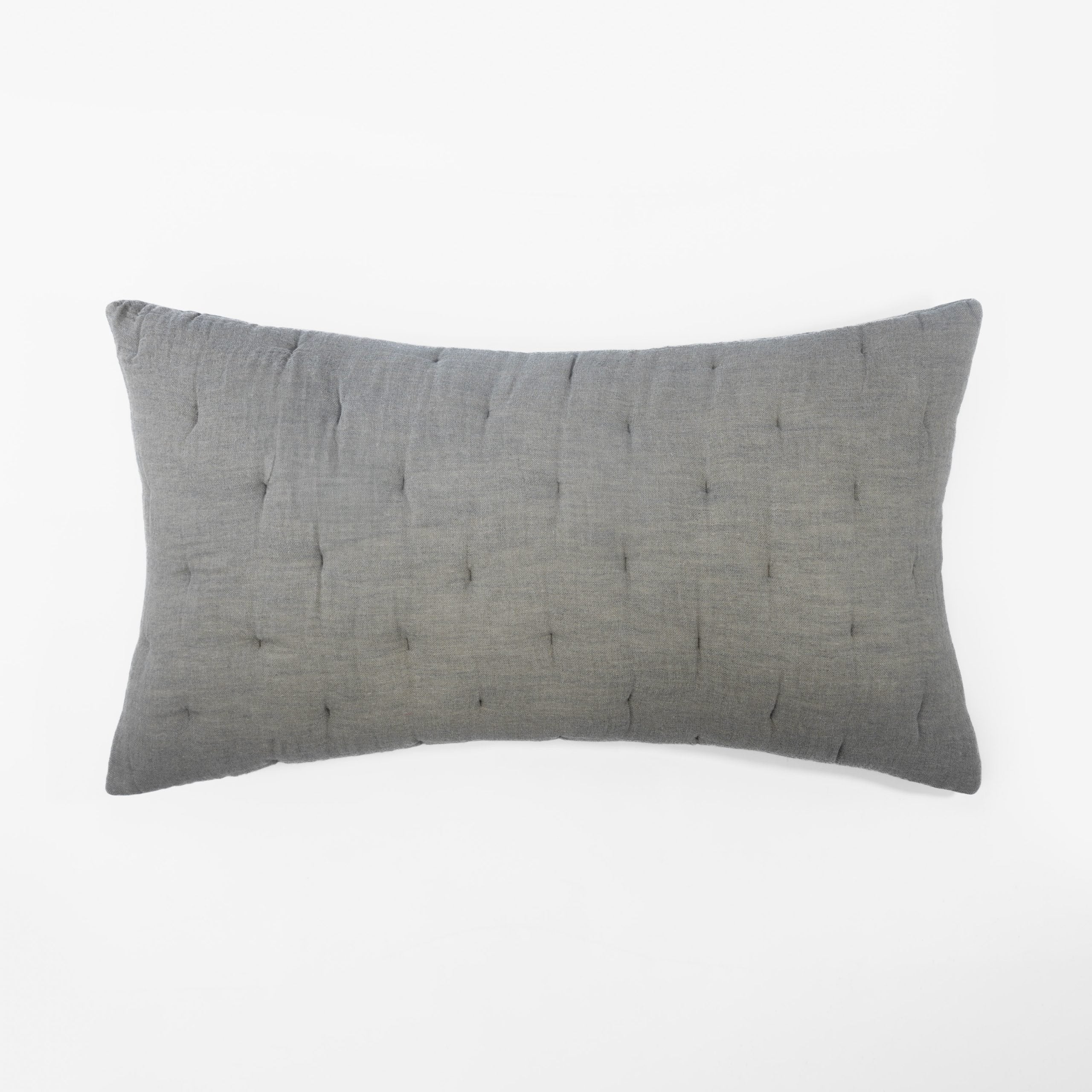 Rectangular grey textured pillow on a white background highlighting fabric texture, stitching, and finish. | Wildwood Home Co.