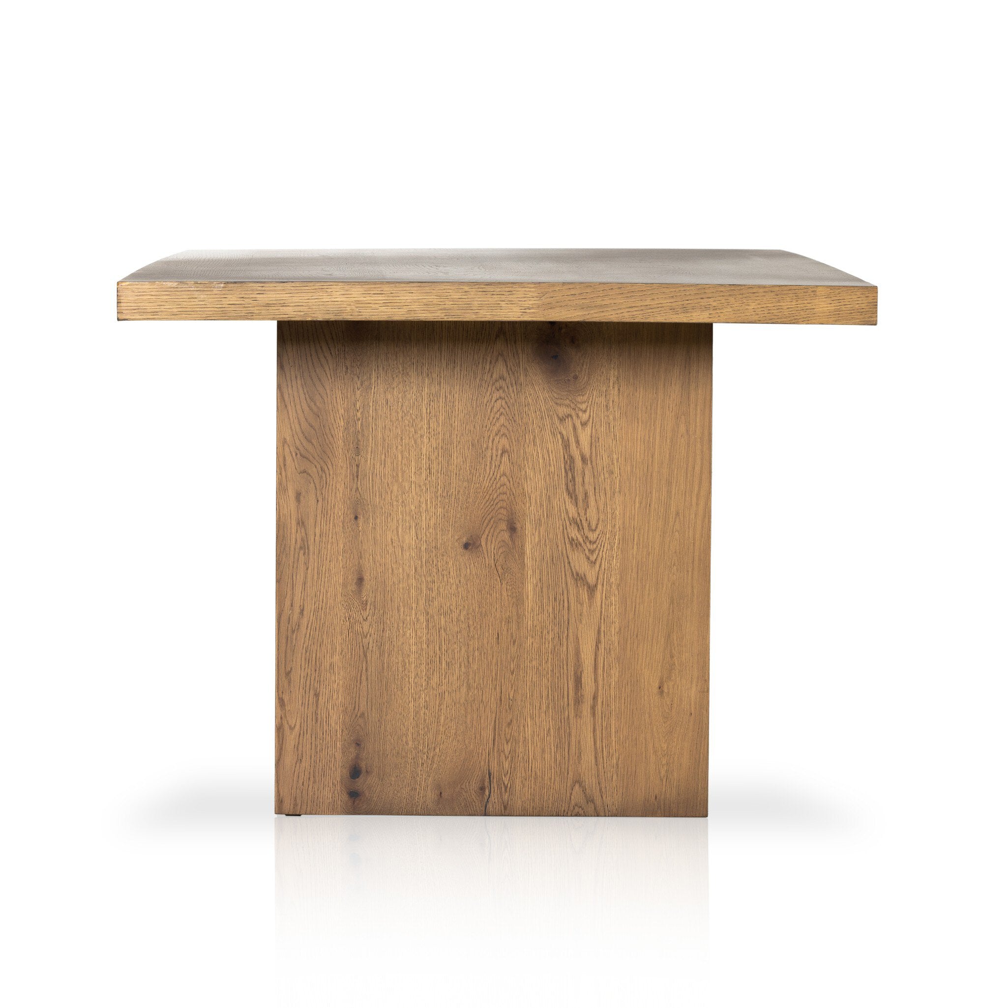 Front view of a wood dining table on a white background.