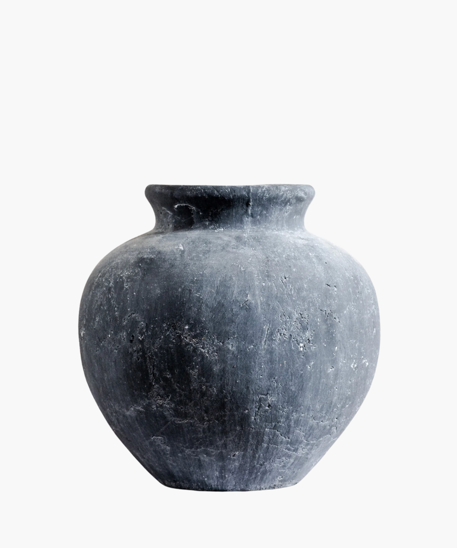 A large, round, weathered gray clay vase with a narrow neck, displaying rough texture and subtle speckles, set against a plain white background. | Wildwood Home Co.