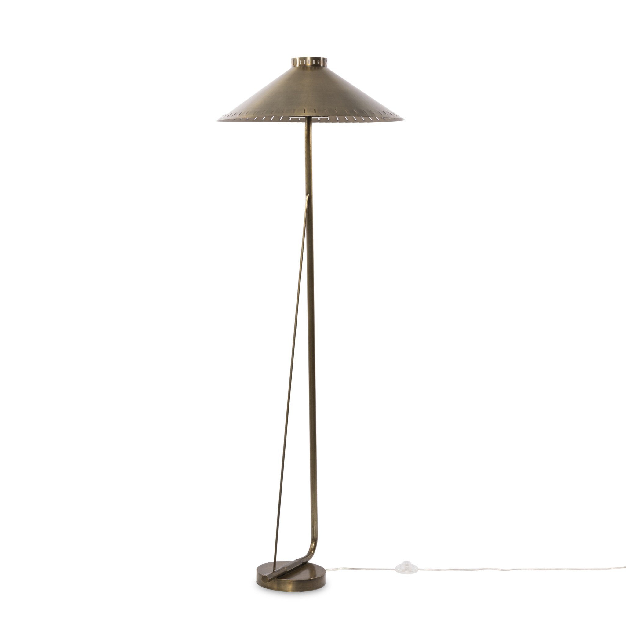 Tall floor lamp with a antique brass shade on a white background.