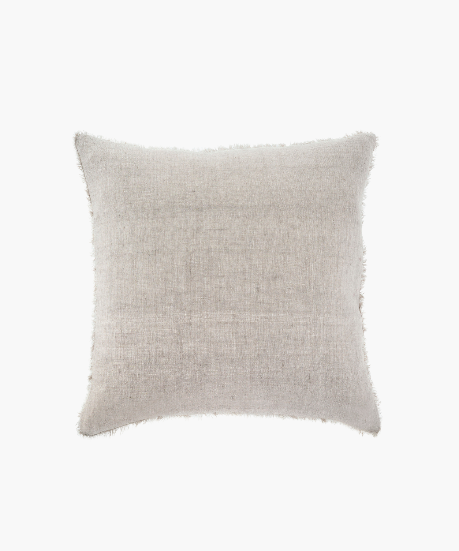 A beige linen throw pillow with a soft, textured surface and frayed edges, conveying a cozy and rustic feel, set against a white background. | Wildwood Home Co.