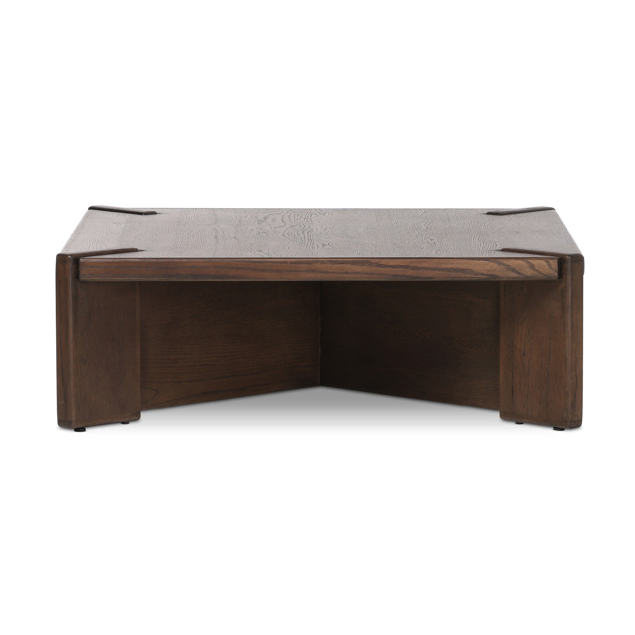 Wooden coffee table with a textured surface on a white background. | Wildwood Home Co.