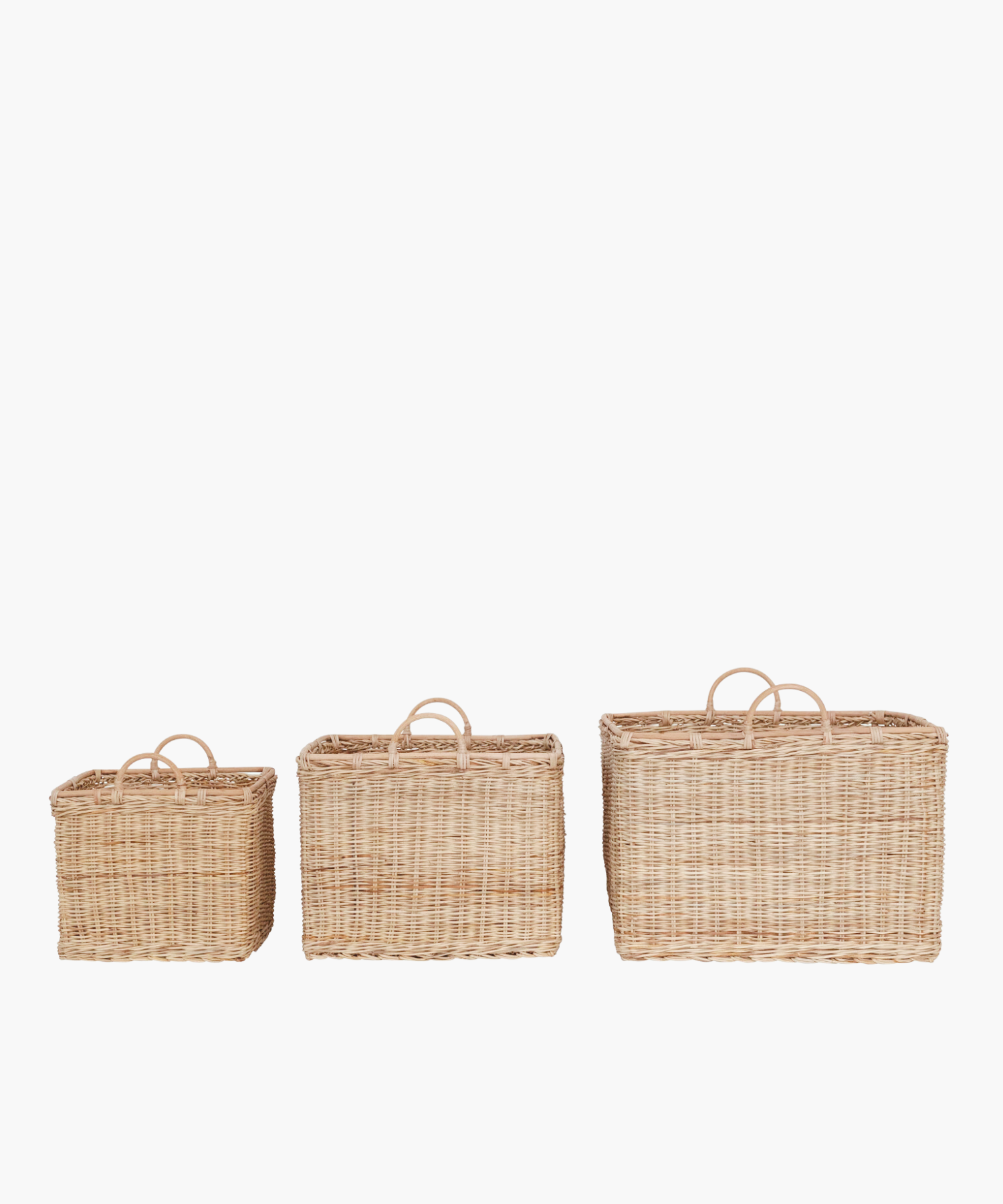 Square rattan baskets with two rounded handles in a natural finish in 3 sizes. The light brown weaving creates an earthy, natural look suitable for storage or decor. | Wildwood Home Co.