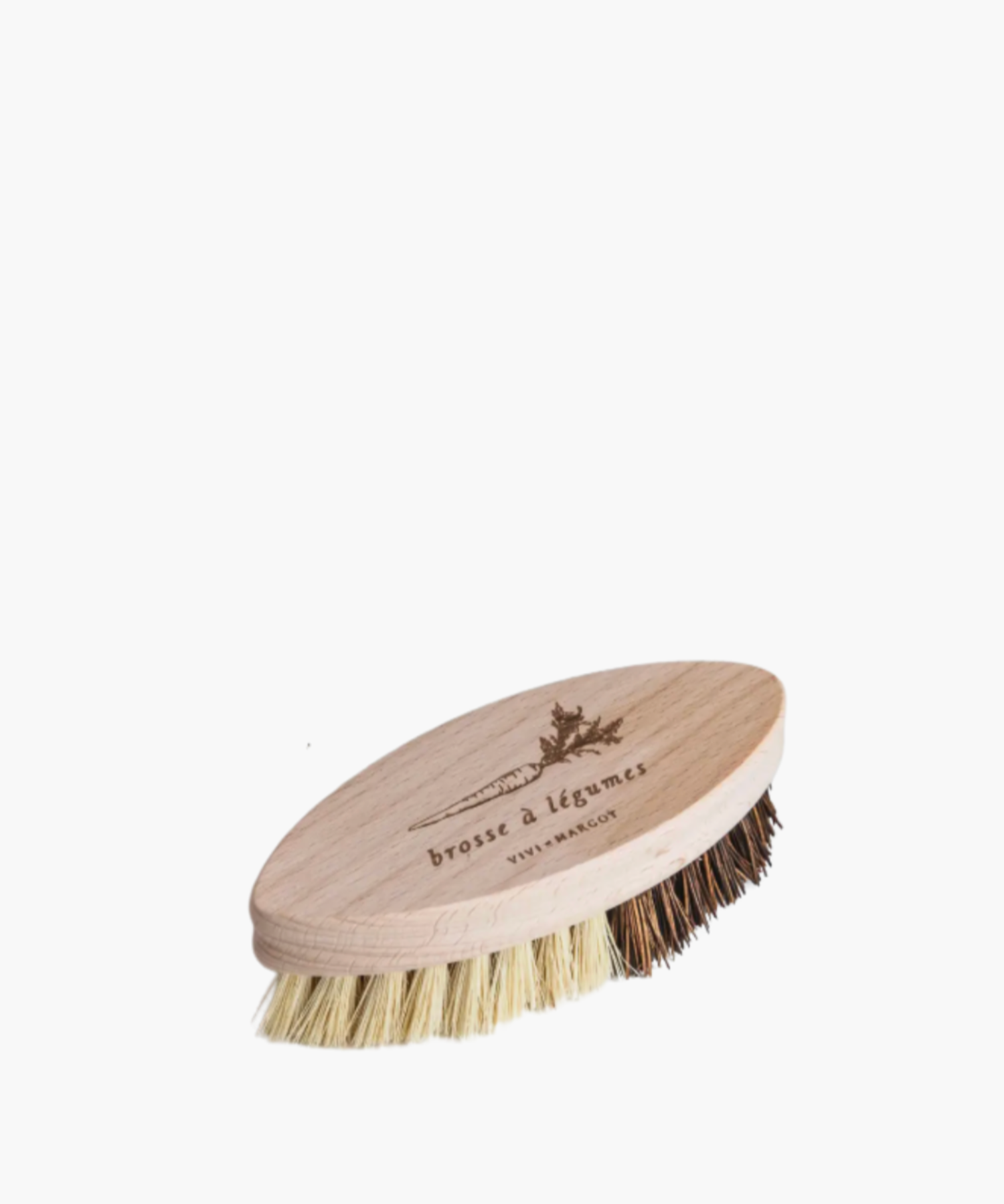 Oval wooden vegetable brush with a light wood finish, featuring light and dark bristles. A carved carrot and French text adorn the top, adding a rustic touch. | Wildwood Home Co.
