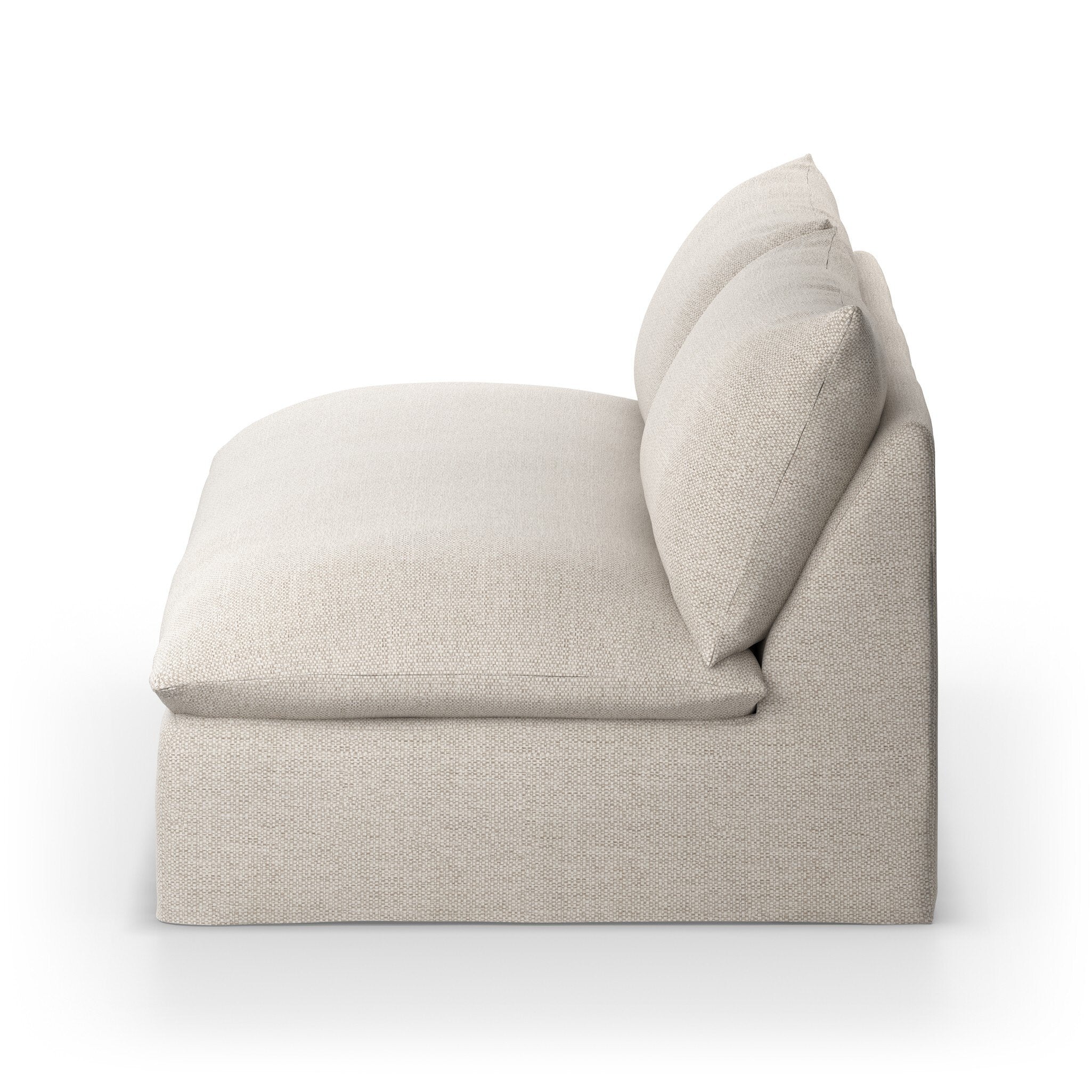 Side profile of a beige slipcover outdoor sofa on a white background.