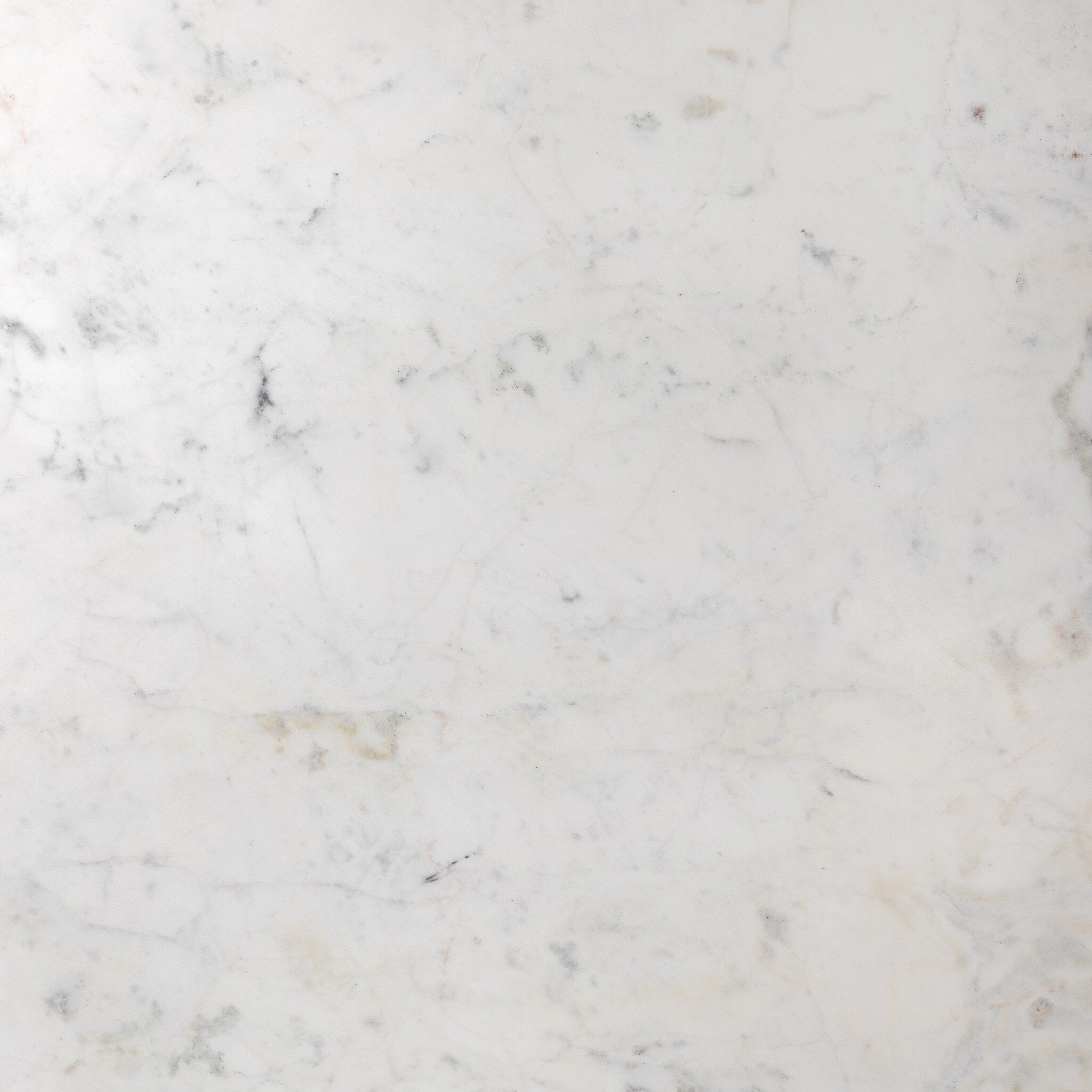 Close up of the marble top showing its color and subtle veining.