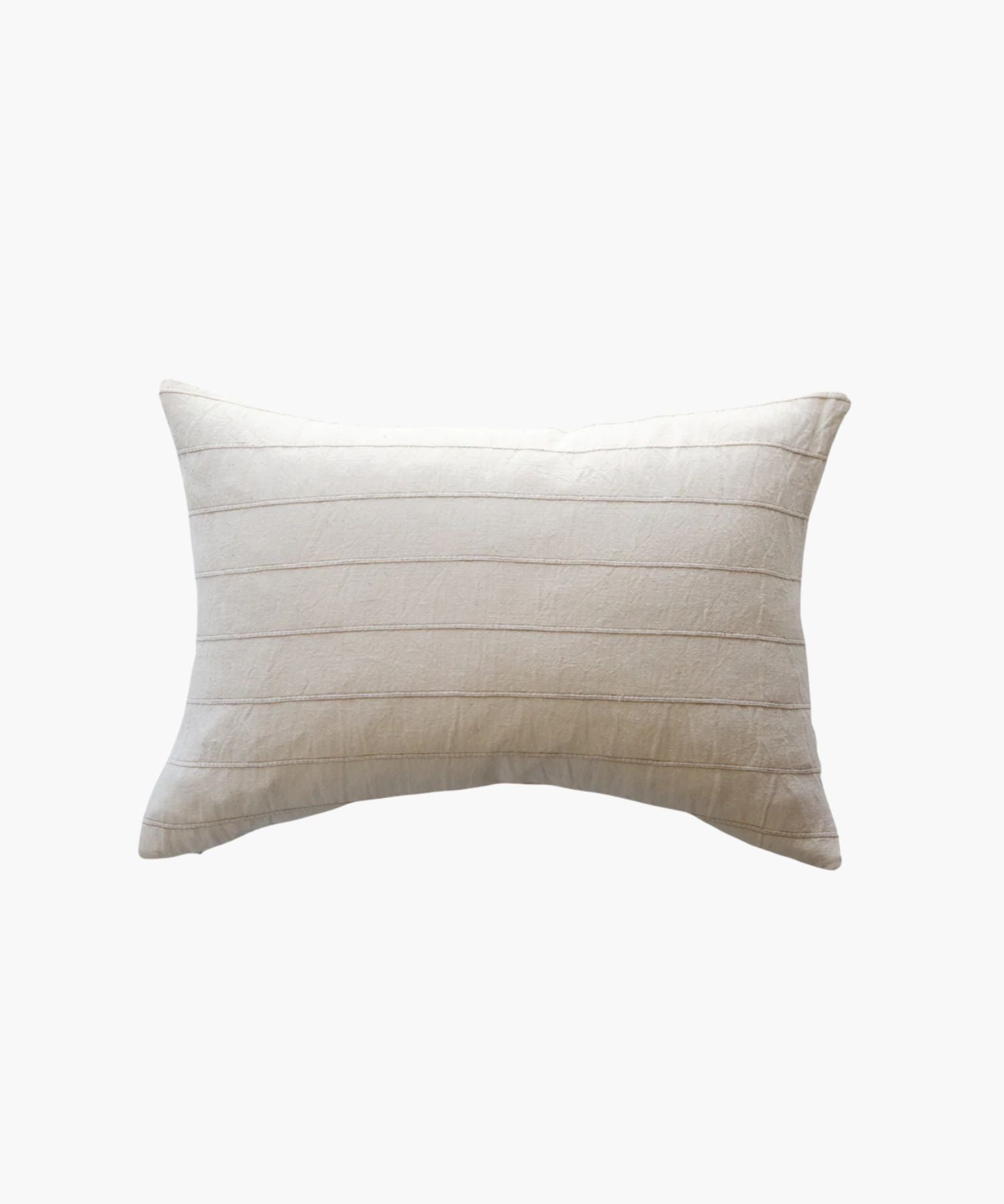 Lumbar beige pillow with pleated texture on a white background. | Wildwood Home Co.