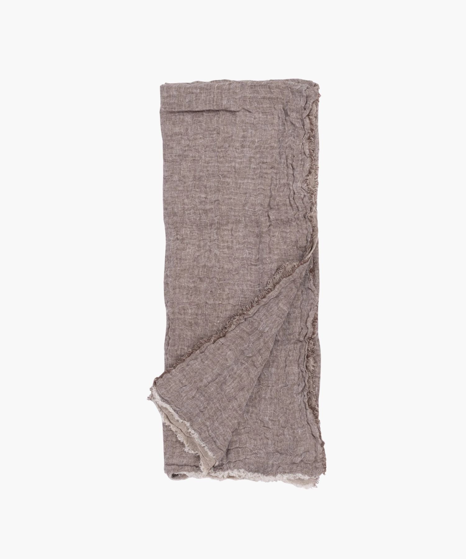 Flat lay of the Kent Super Throw in natural brown linen tone, highlighting its oversized linen gauze texture and soft fringed edges. | Wildwood Home Co.
