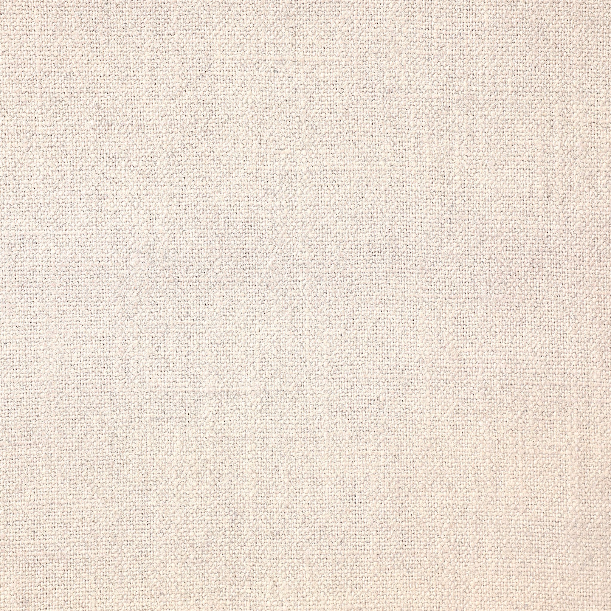 Close up of the painted linen fabric on the nightstand showing its color and fabric texture.