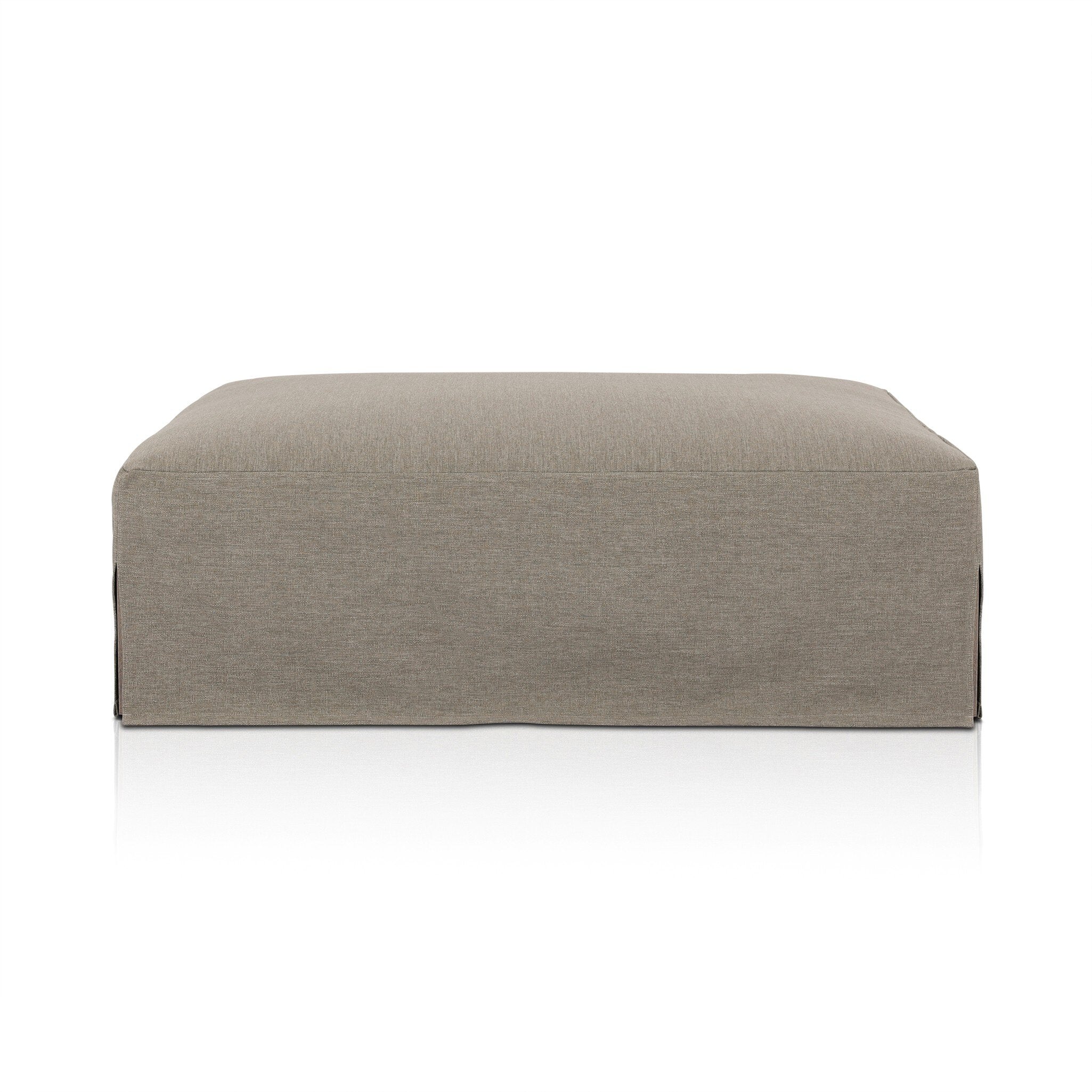 Slipcover gray outdoor ottoman on a white background. | Wildwood Home Co.