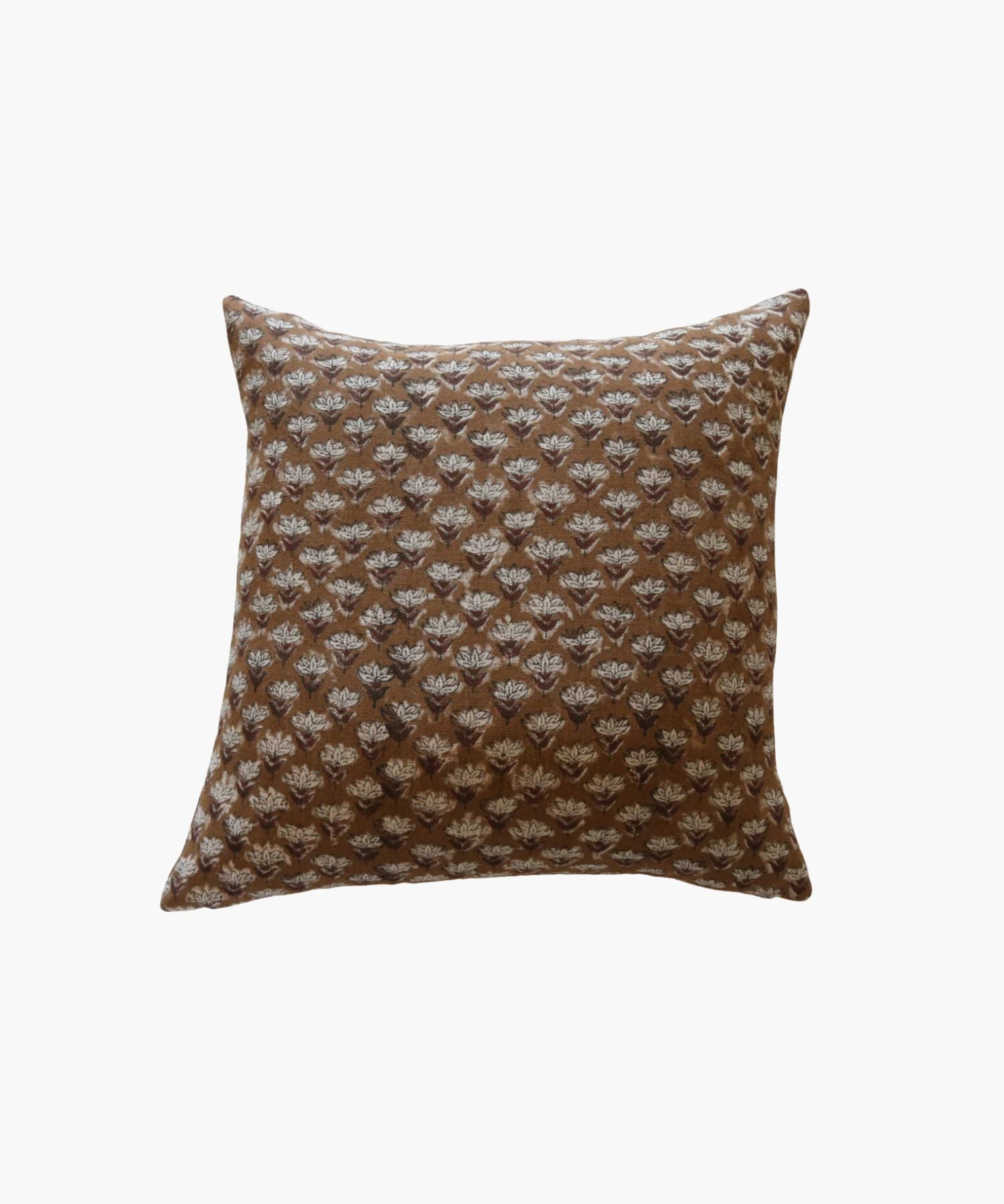 Brown pillow with a subtle floral pattern on a white background. | Wildwood Home Co.