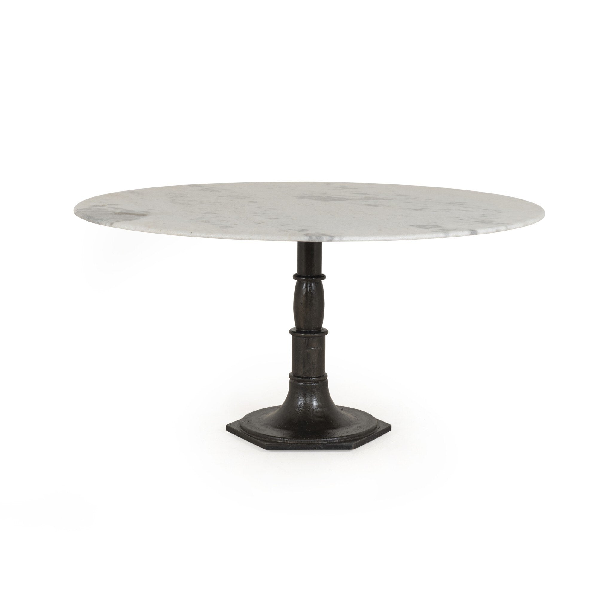 Round marble dining table with a black metal pedestal base on a white background. | Wildwood Home Co.