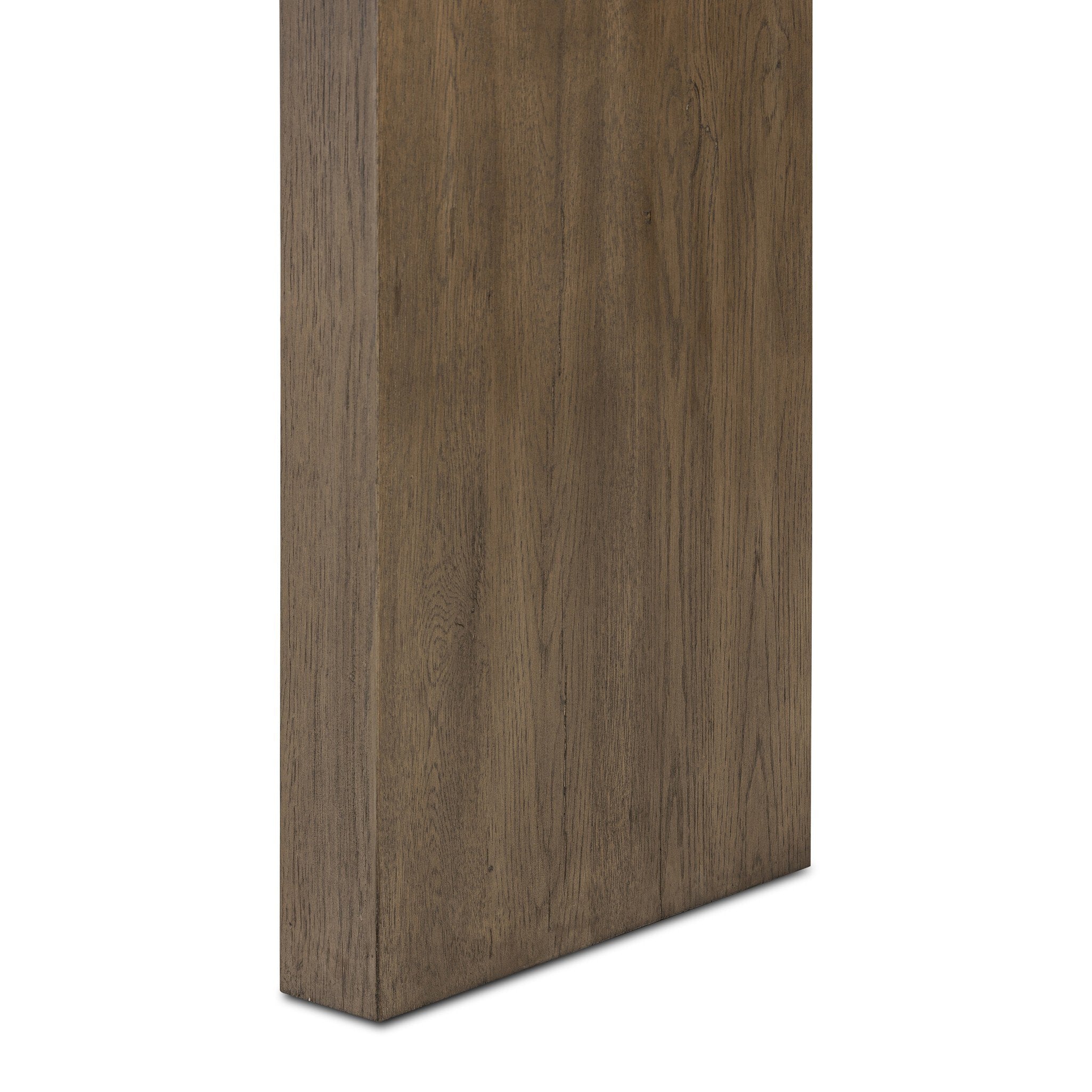 Close up of a wooden console table with a curved design on a white background.