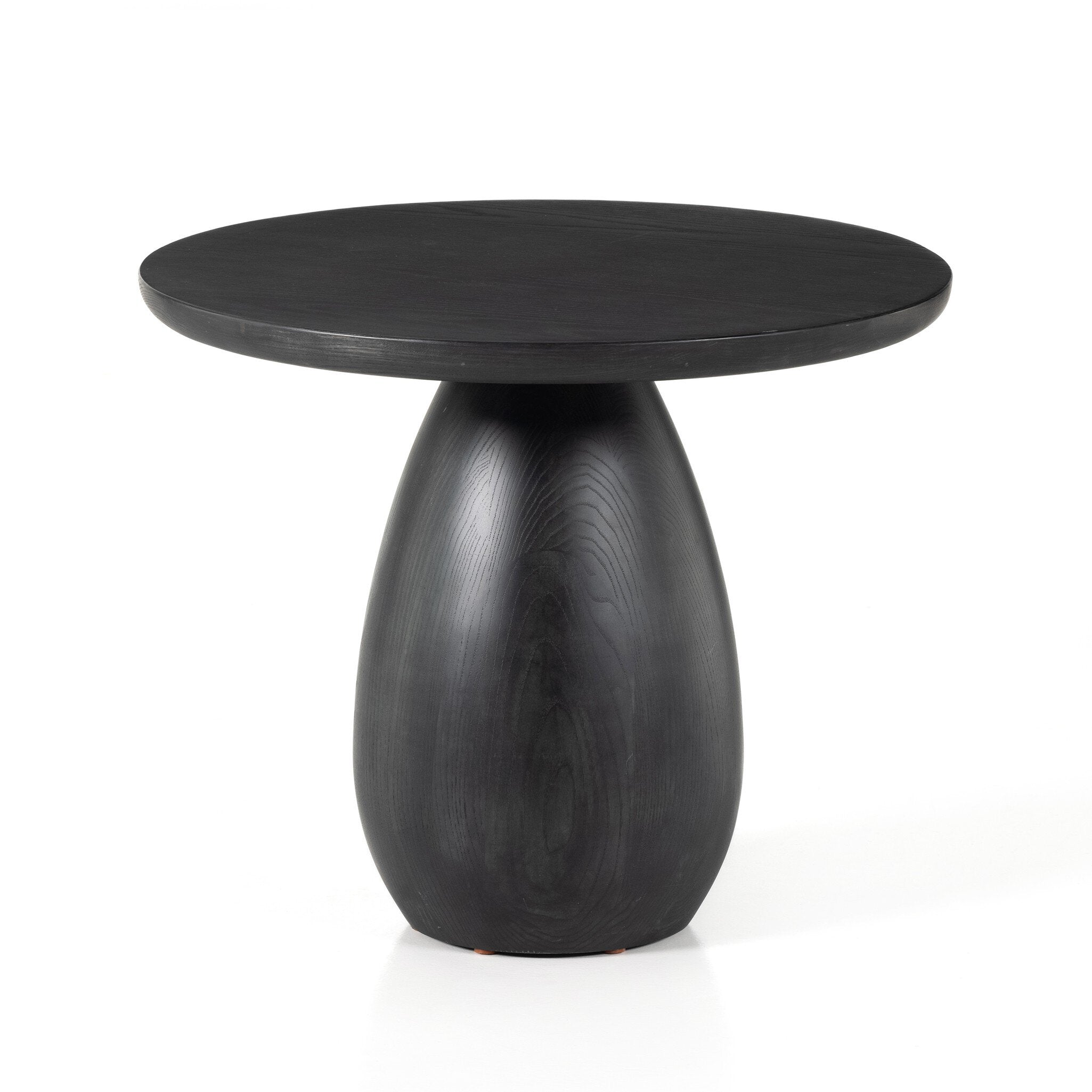 Black-washed solid ash round end table on a white background. | Wildwood Home Co.