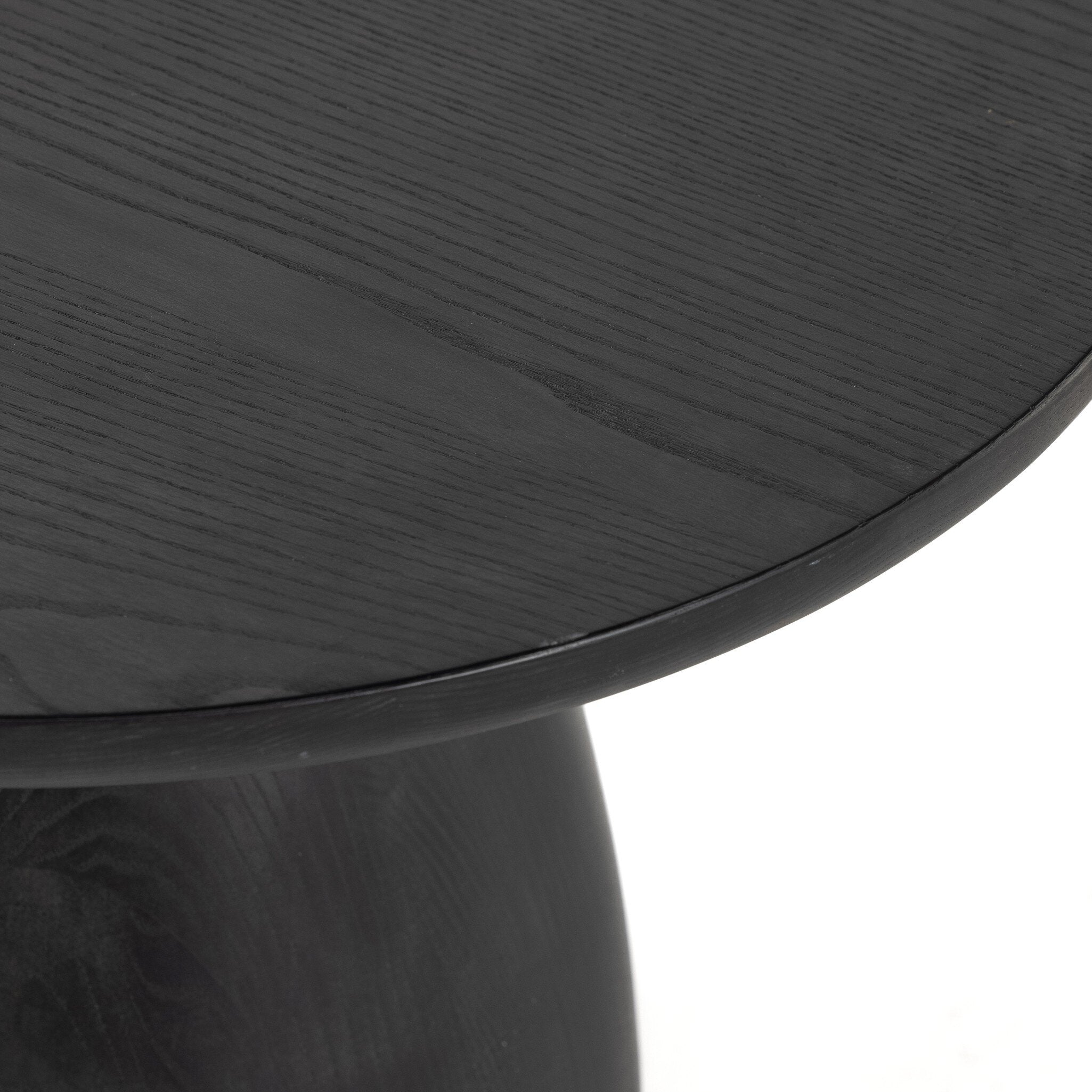 Black-washed solid ash round end table on a white background.