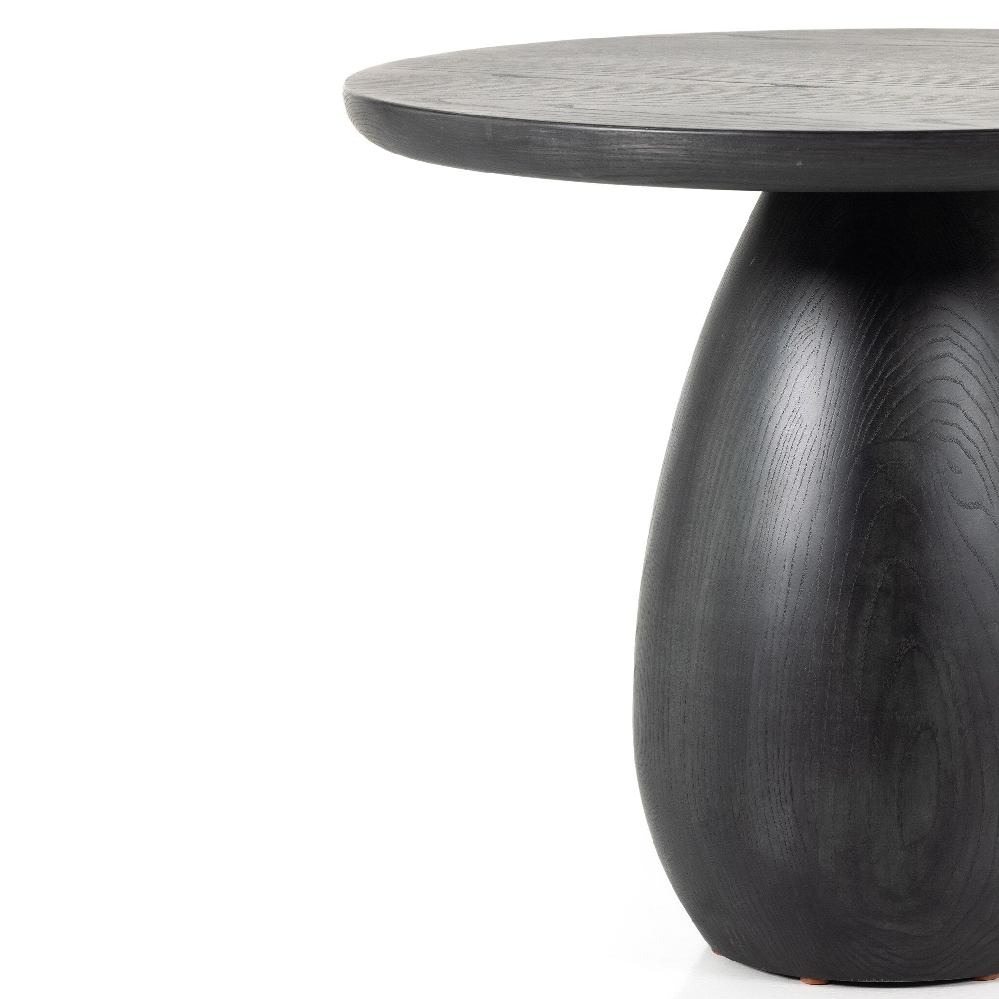 Black-washed solid ash round end table on a white background.