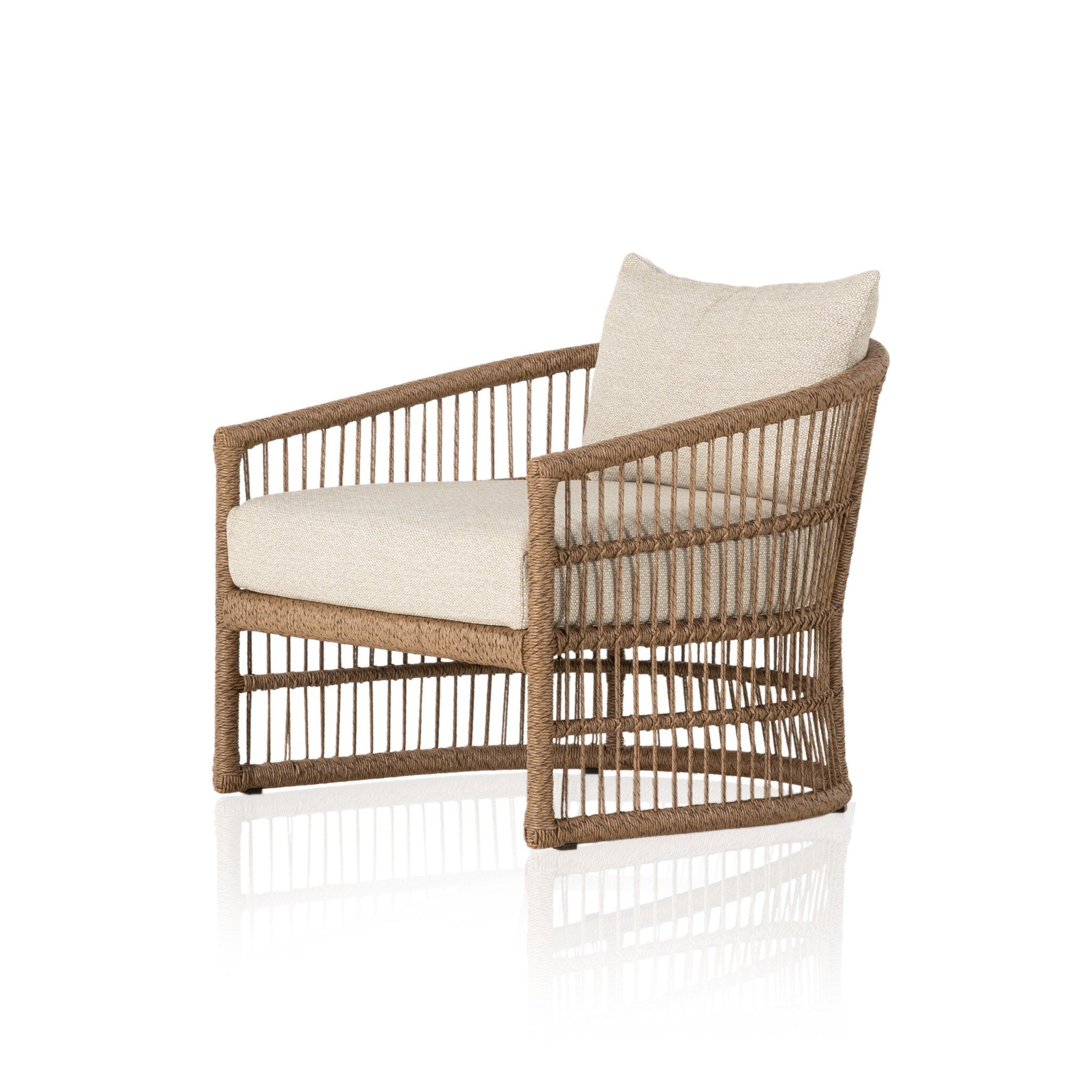 Cottage inspired outdoor chair with wrapping and texture along with beige colored upholstered cushions on a white background.