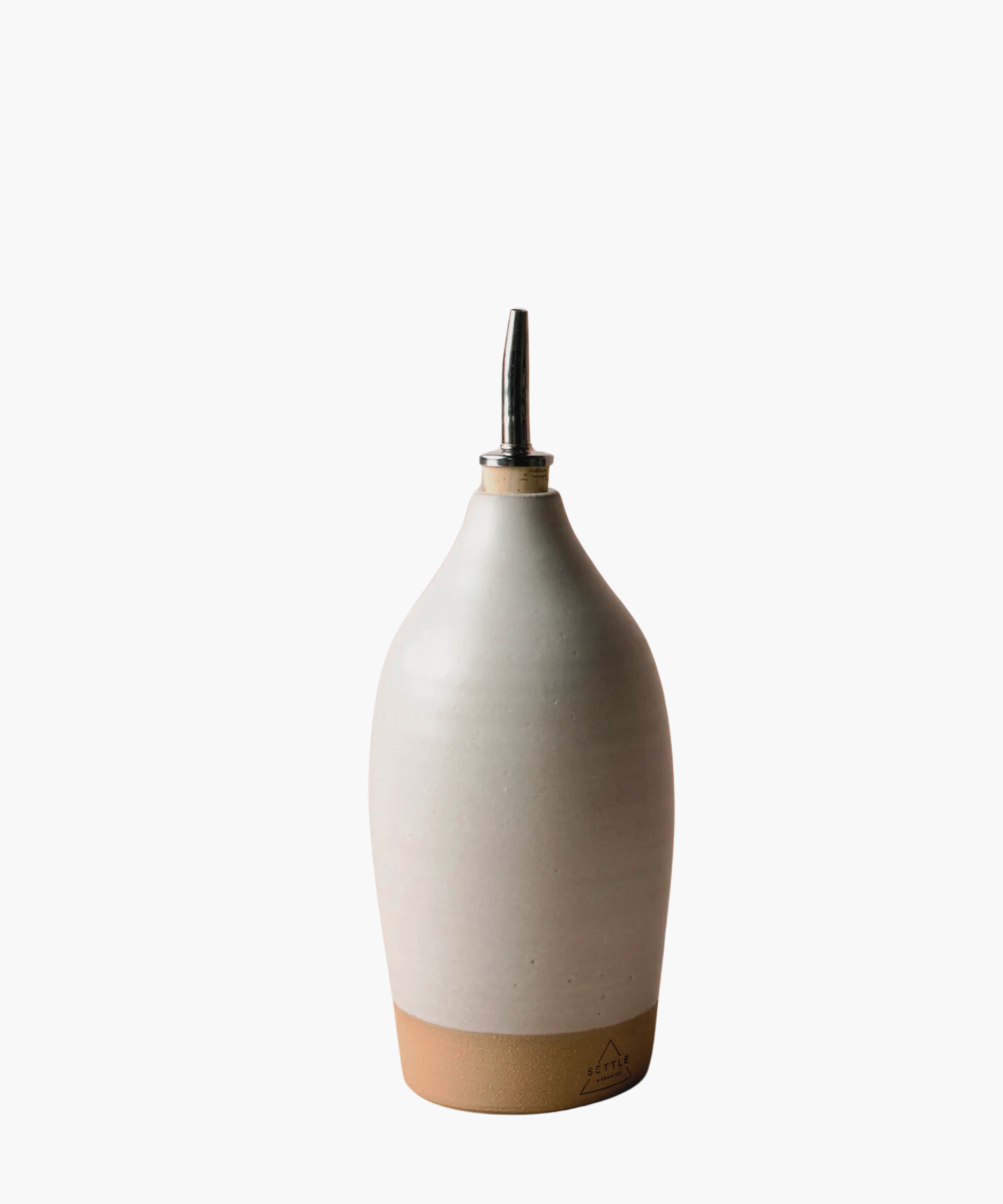 18-20oz ceramic bottle with an off white matte finish, topped with a metal spout. It conveys a minimalist and elegant tone. | Wildwood Home Co.