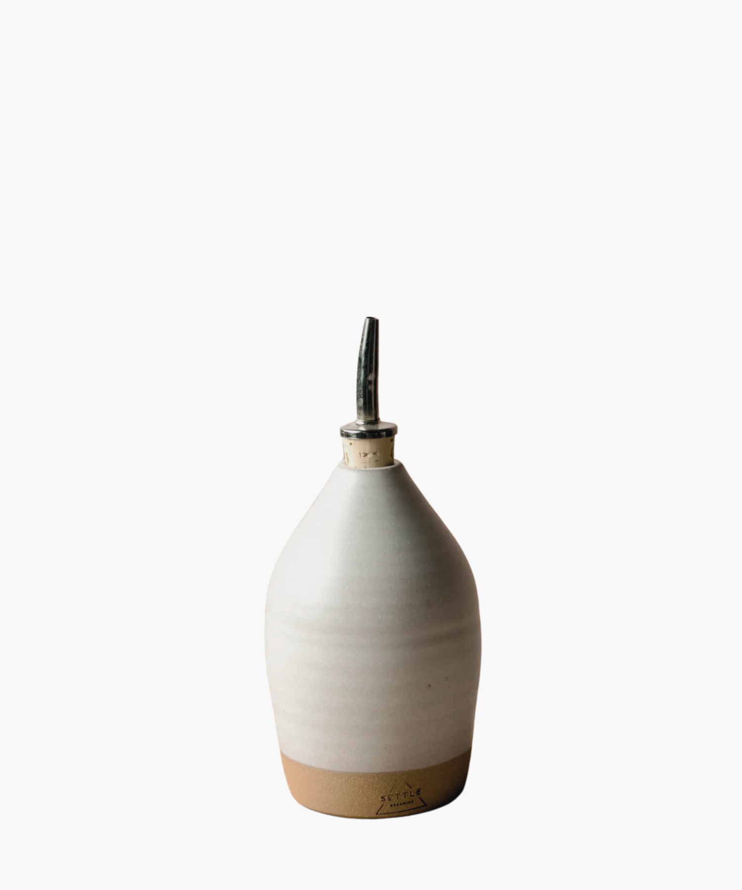 14oz ceramic bottle with an off white matte finish, topped with a metal spout. It conveys a minimalist and elegant tone. | Wildwood Home Co.