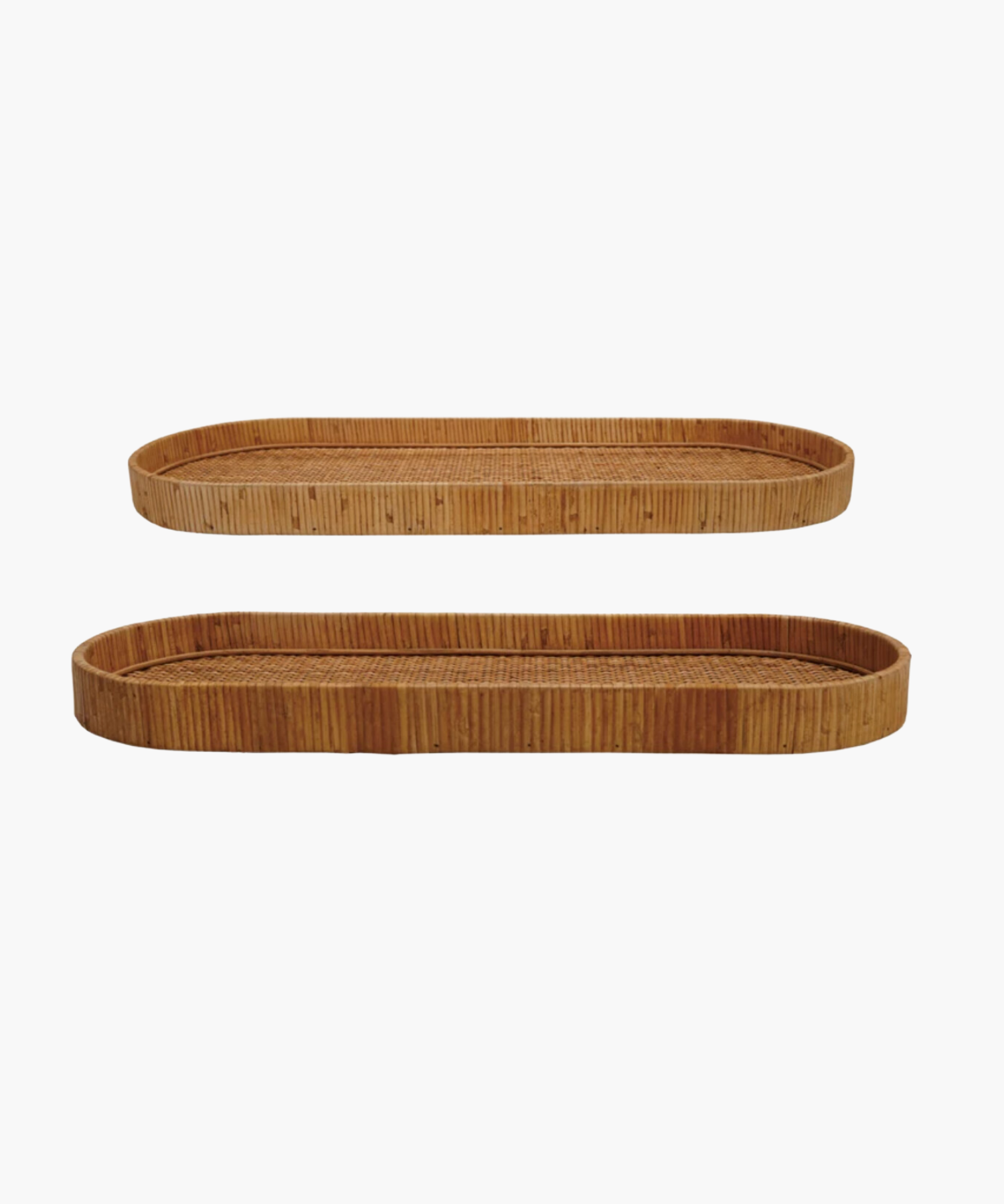 Two oval wicker handwoven trays with rounded edges, one smaller above the larger one, against a white background. Natural, rustic texture.