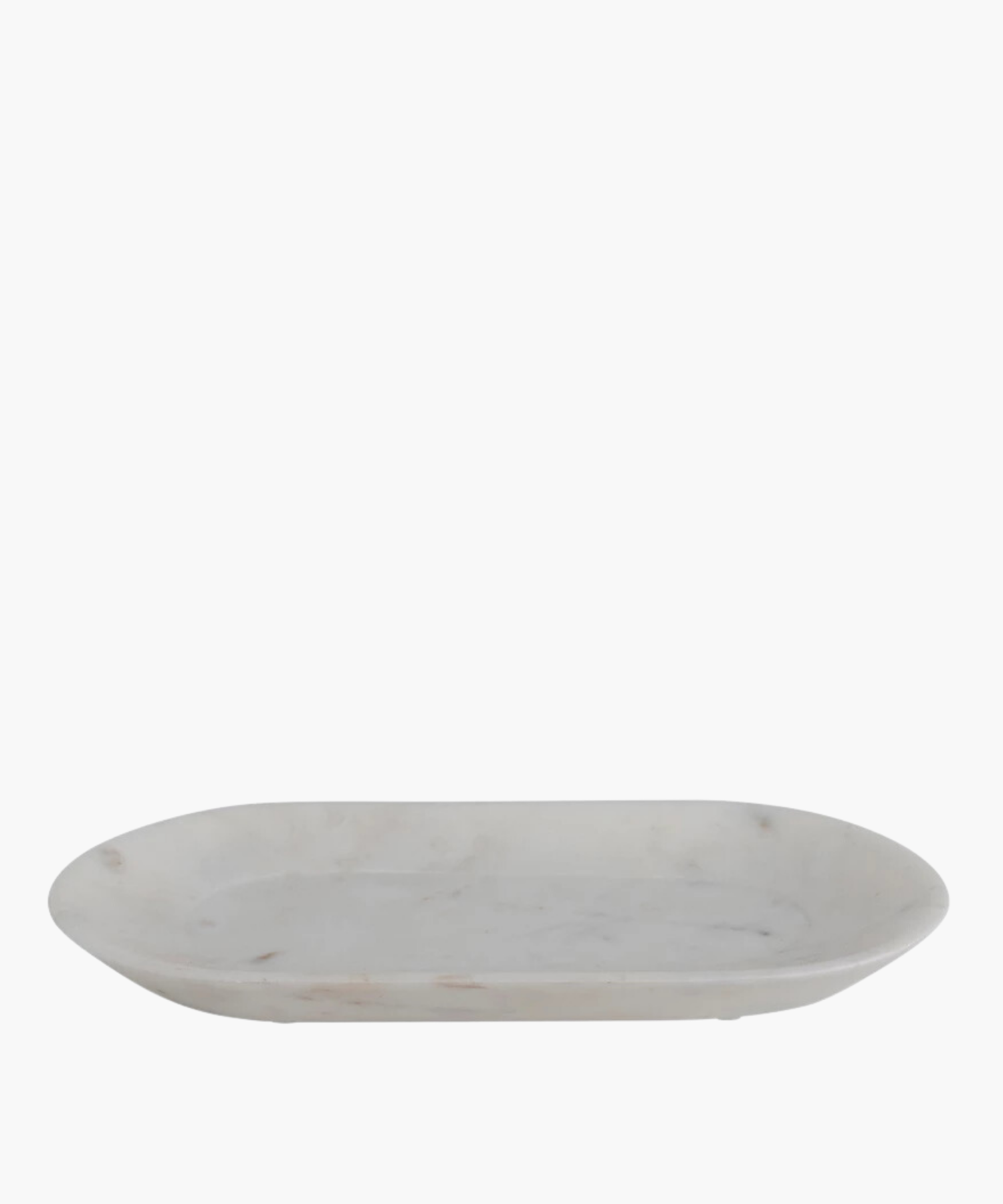 An elegant white marble tray with subtle gray veining, oval-shaped, conveying simplicity and sophistication.