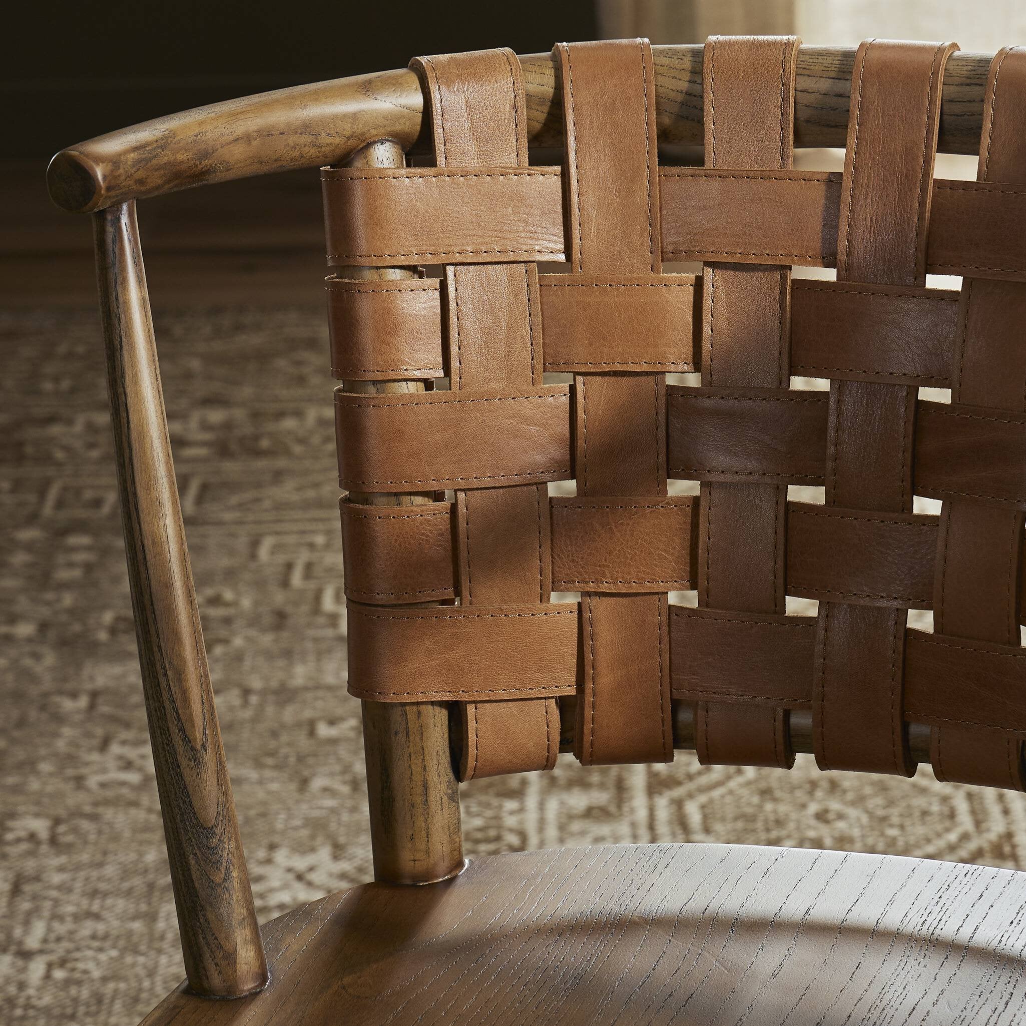 Close-up of a brown woven chair with a blurred background