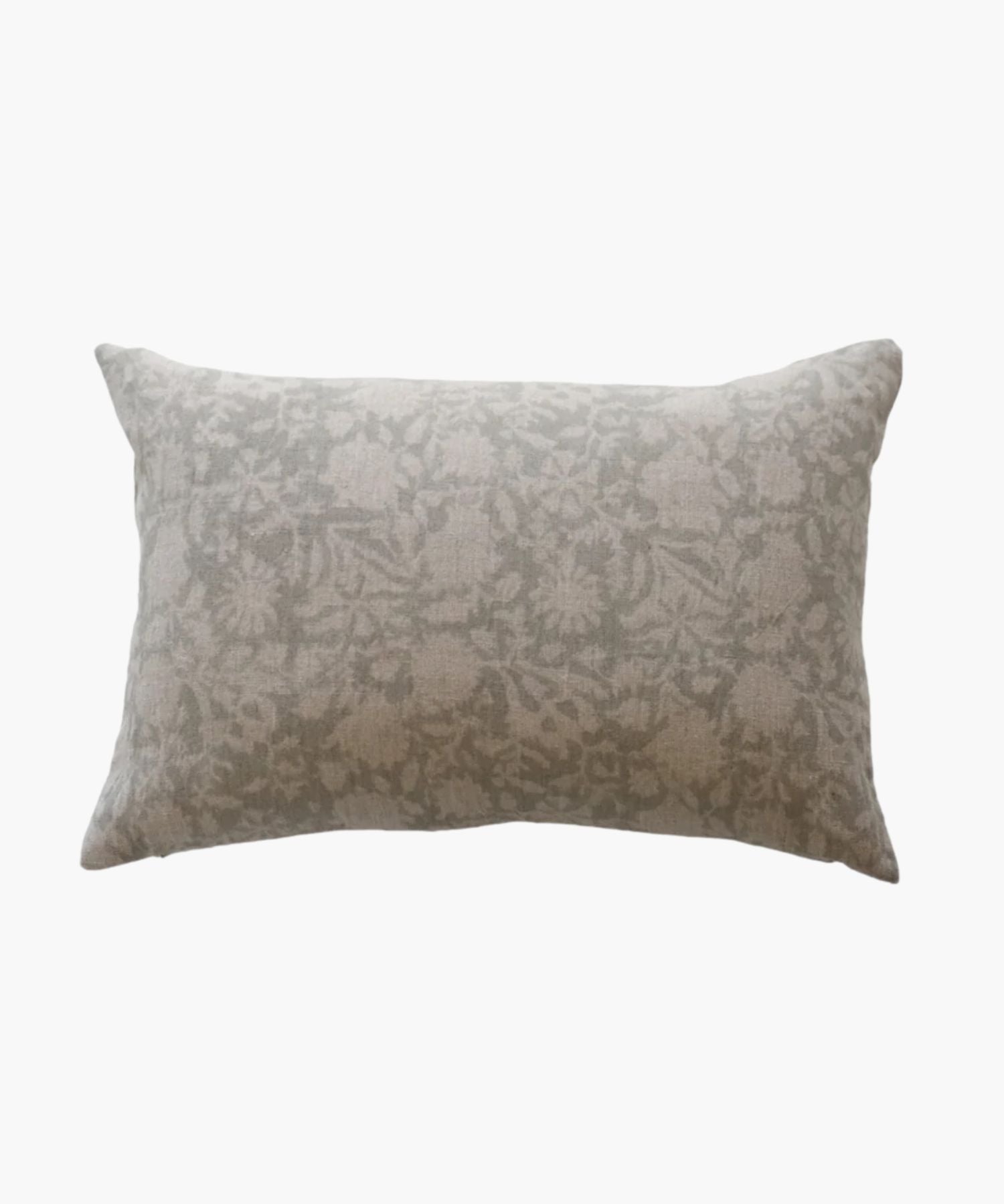 A rectangular or lumbar pillow with a subtle floral pattern in soft grey tones on a natural linen fabric. The design is delicate, creating a cozy and elegant feel. | Wildwood Home Co.