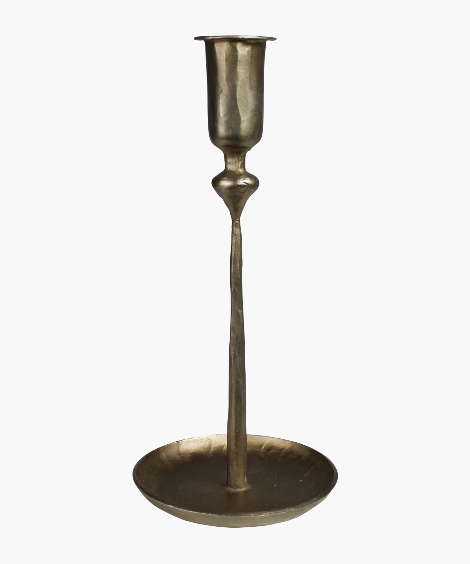 Antique inspired brass plated candle holder with a textured surface sitting on a circular base.