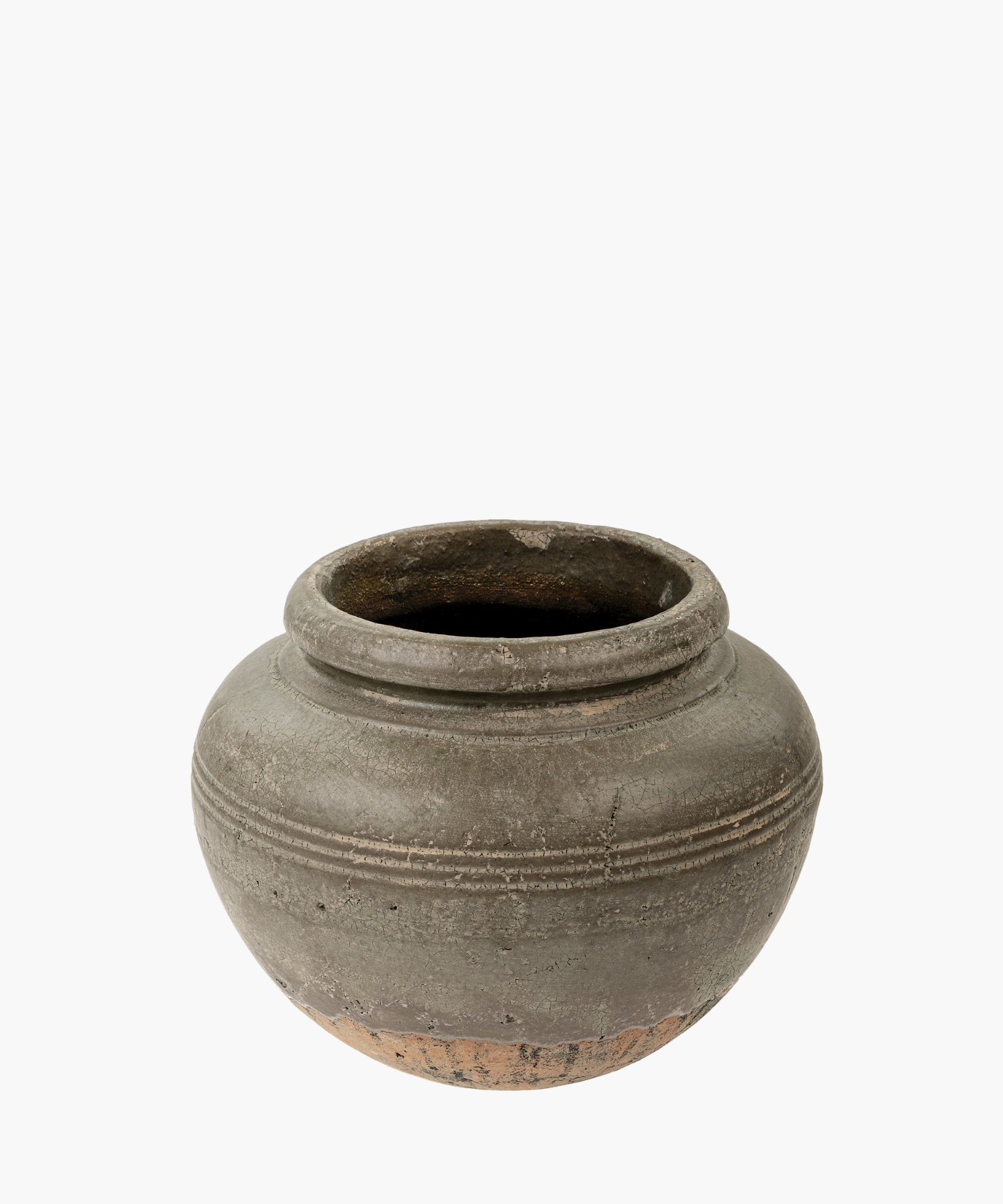 A round, weathered clay vase with a wide opening and decorative horizontal ridges. The vase conveys an earthy, rustic, and historical feel. | Wildwood Home Co.