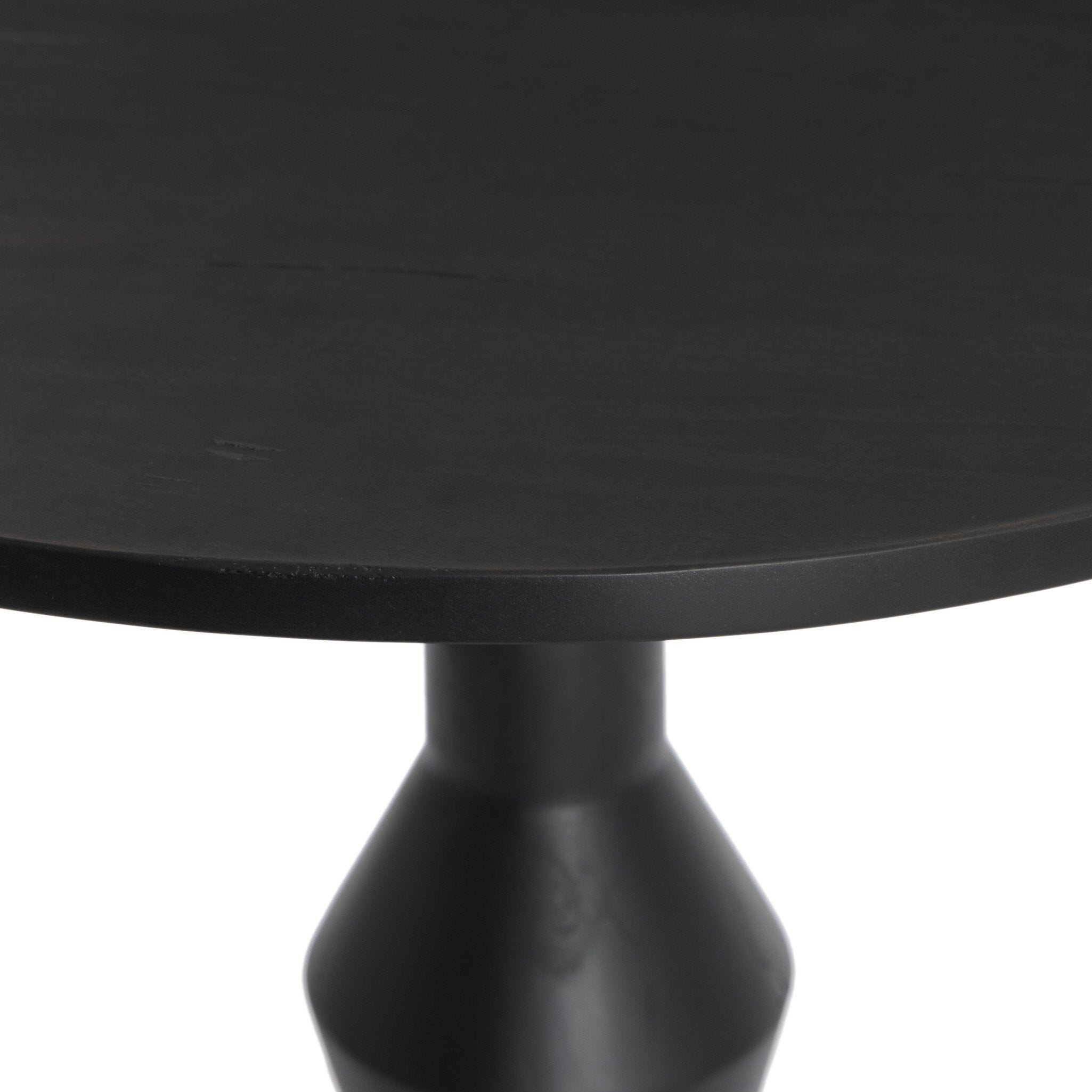 Black round end table with a pedestal base with tripod feet on a white background.