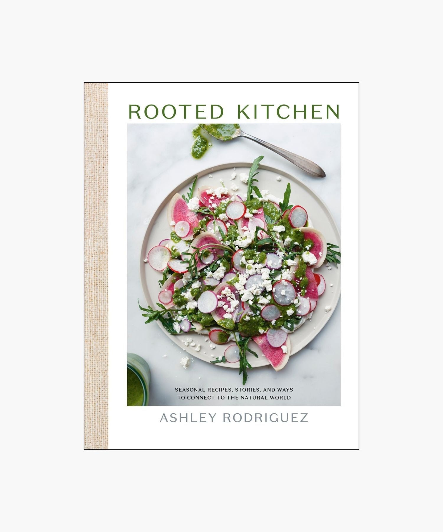 The cover of the book "Rooted Kitchen" by Ashley Rodriguez features a vibrant salad with radishes, arugula, and feta. It conveys freshness and culinary creativity. | Wildwood Home Co.