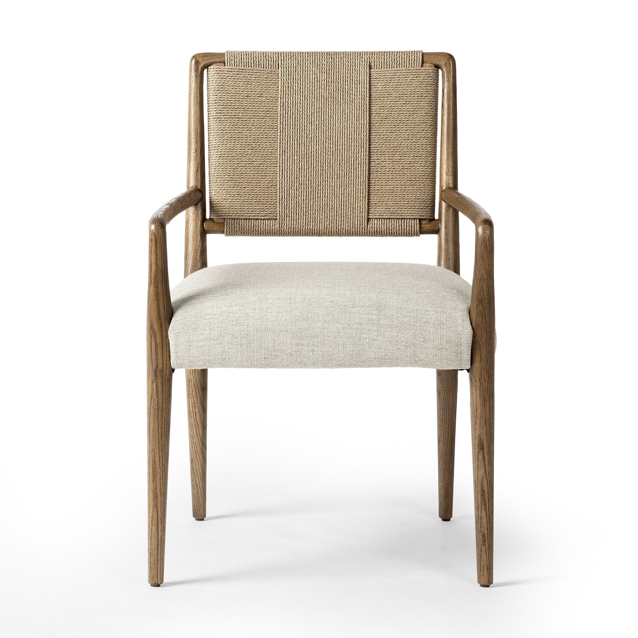 Dining chair with woven backrest and upholstered seat on a white background. | Wildwood Home Co.