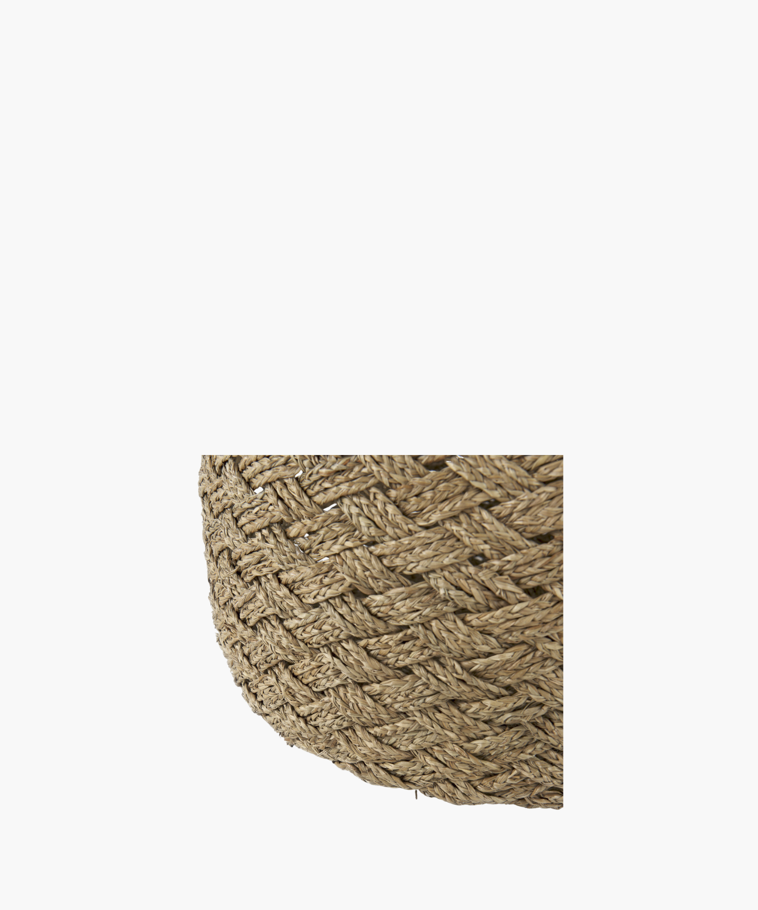 A detailed picture of a woven basket highlighting its natural, textured appearance. The intricate zigzag pattern in earthy tones suggests rustic charm and simple elegance.