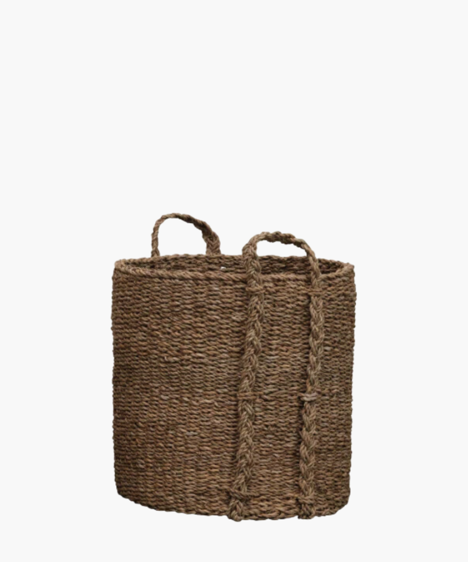 Textured brown woven basket with two braided handles, made from natural material. The basket has a rustic and earthy appearance. | Wildwood Home Co.