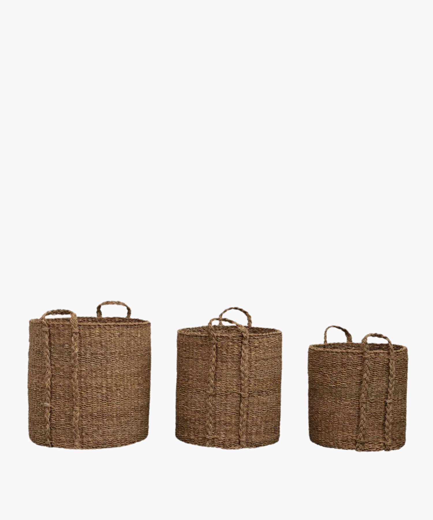 Textured brown woven baskets with two braided handles, made from natural material in 3 sizes. The baskets have a rustic and earthy appearance. | Wildwood Home Co.